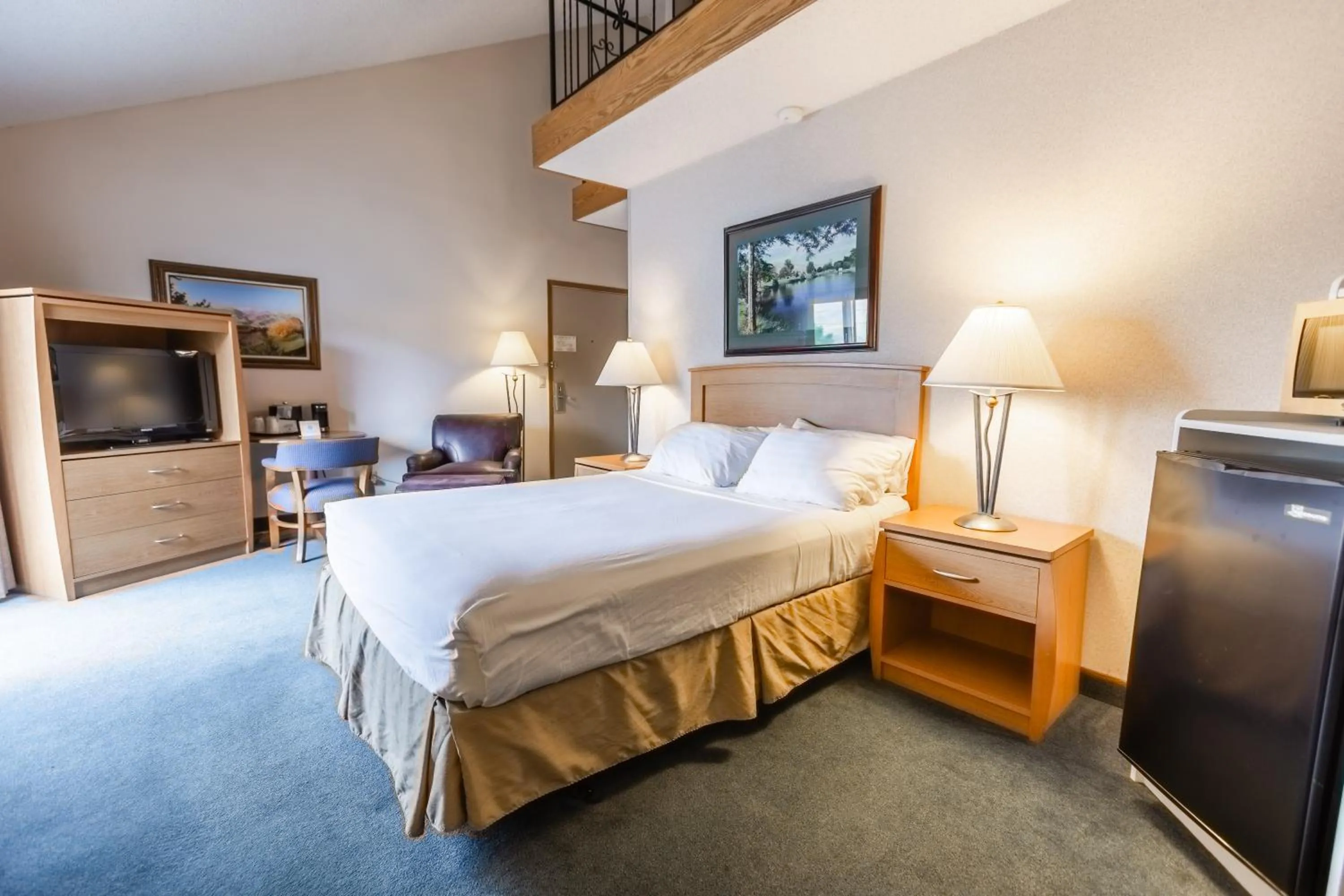 Bed in RiverTree Inn & Suites