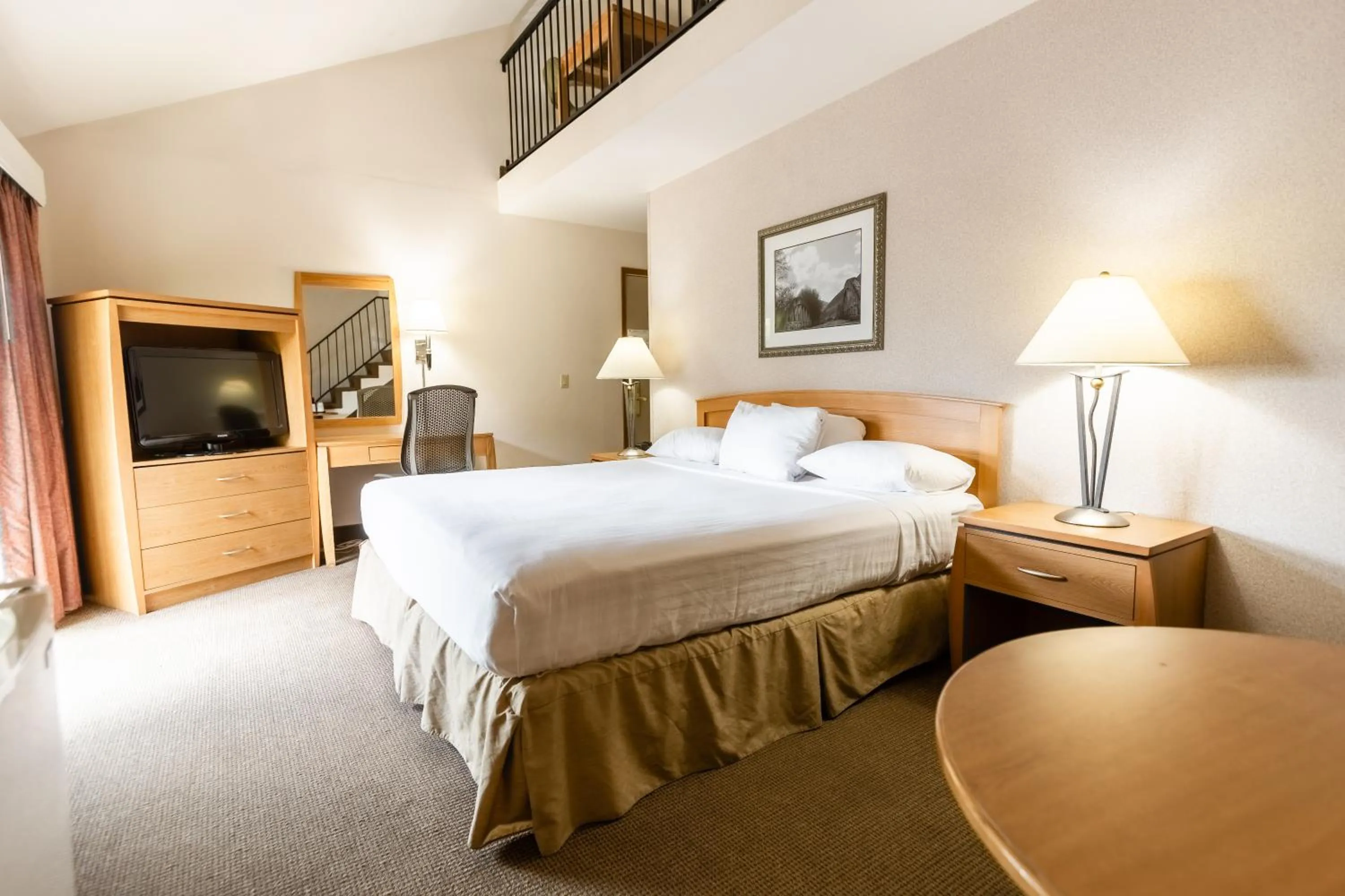 Bed in RiverTree Inn & Suites