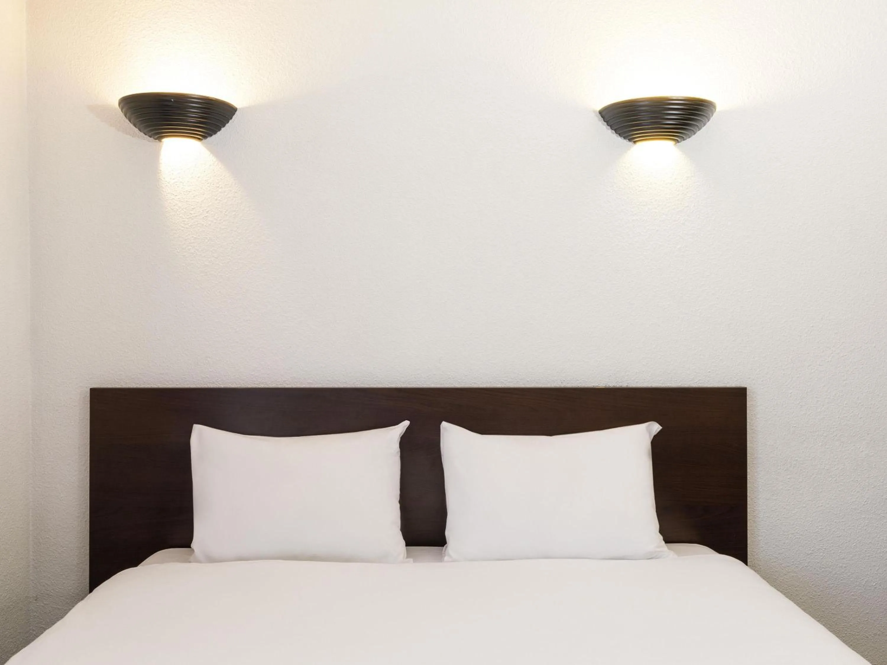 Bedroom, Bed in Aparthotel Adagio Access La Défense - Place Charras