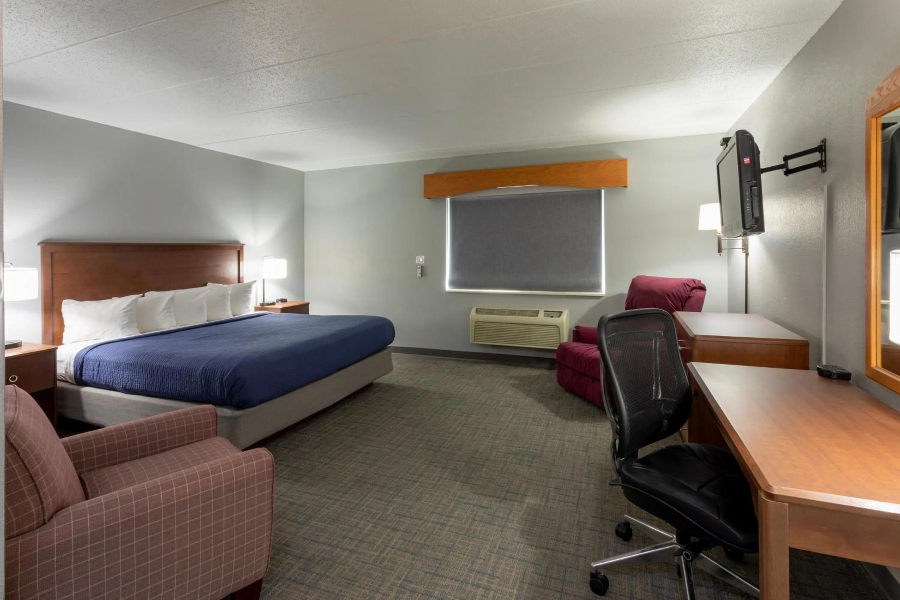 Bed in Black Beach Inn by GrandStay