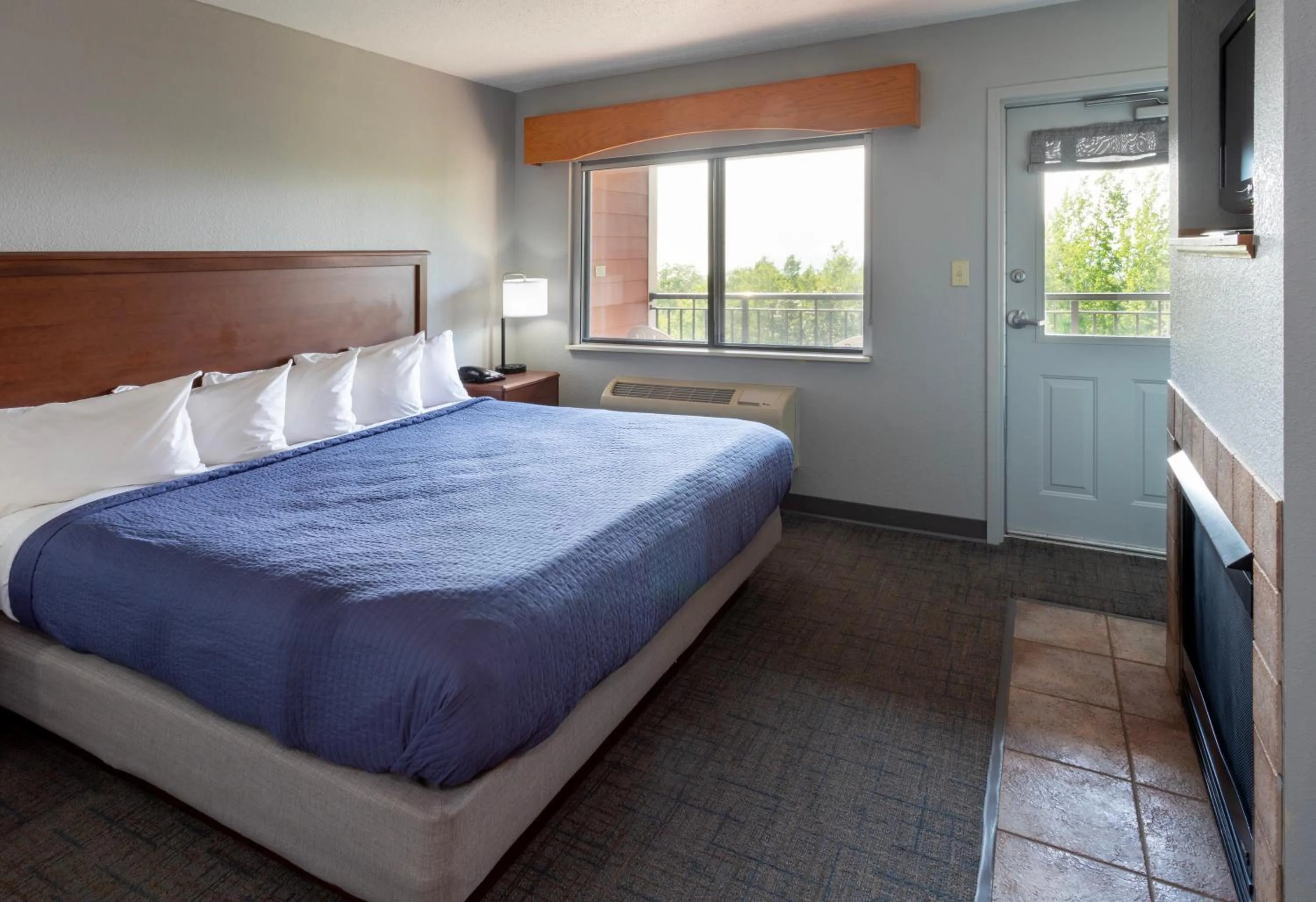 Bed in Black Beach Inn by GrandStay