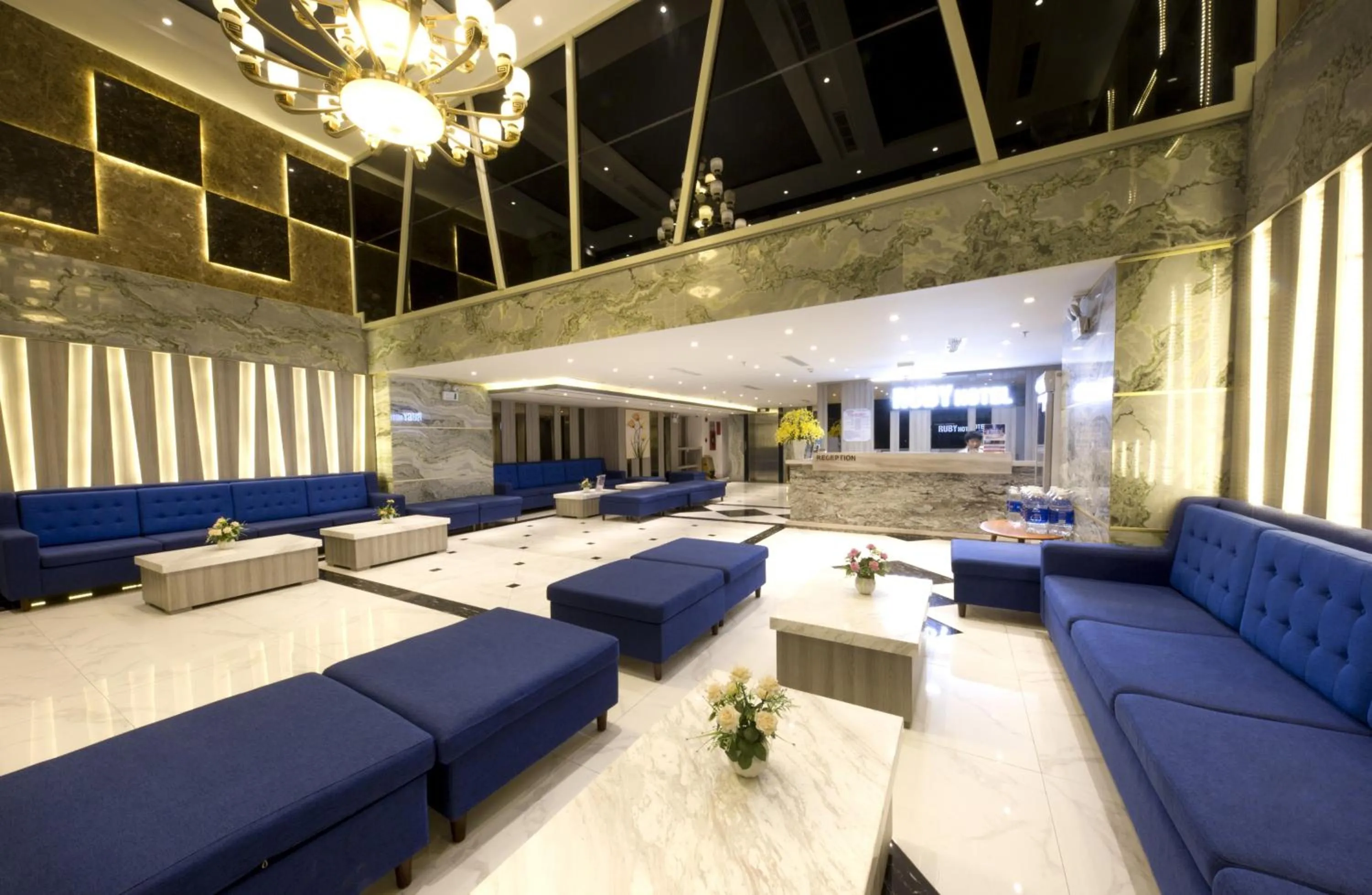 Communal lounge/ TV room in Ruby Luxury Hotel