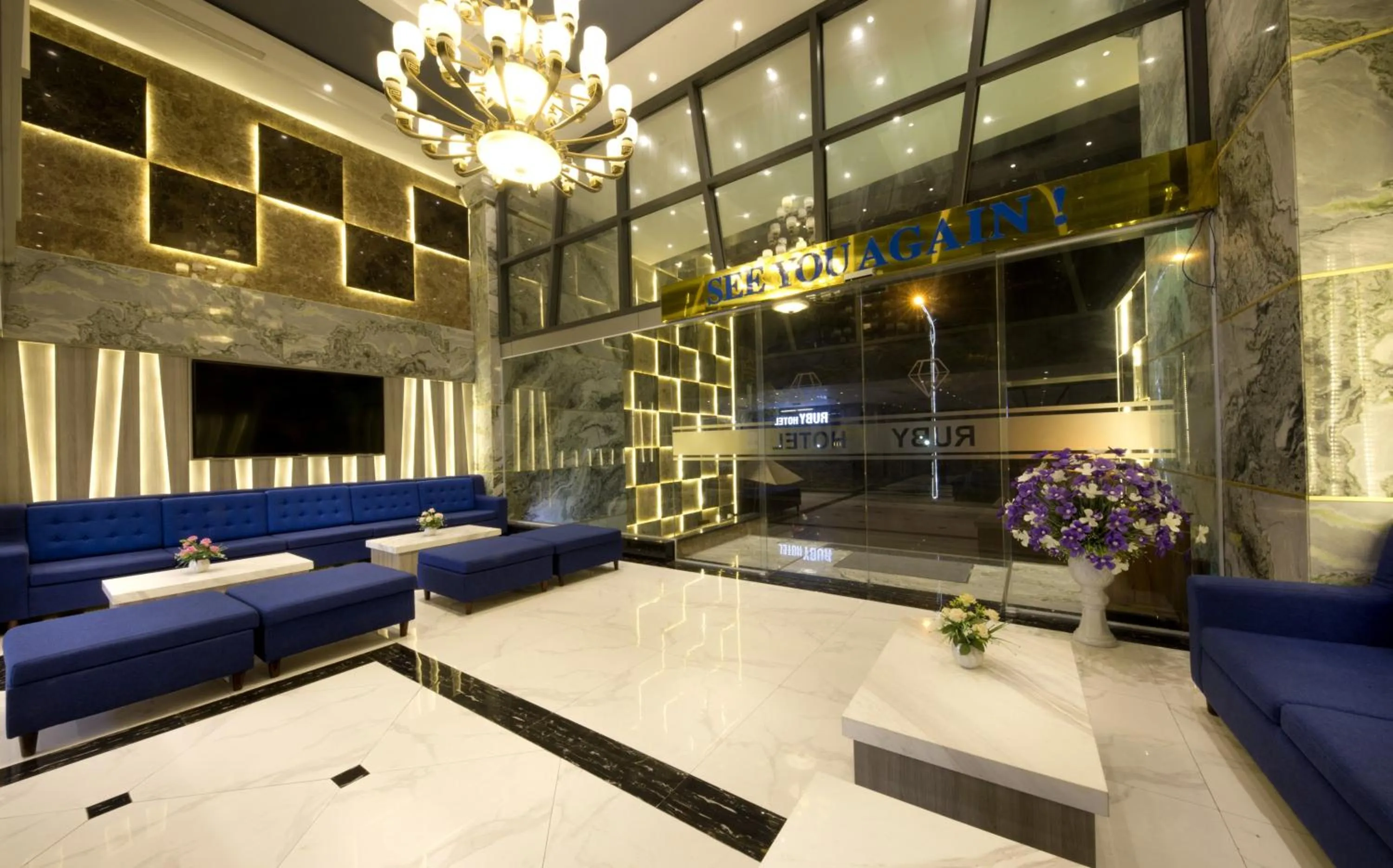 Communal lounge/ TV room in Ruby Luxury Hotel