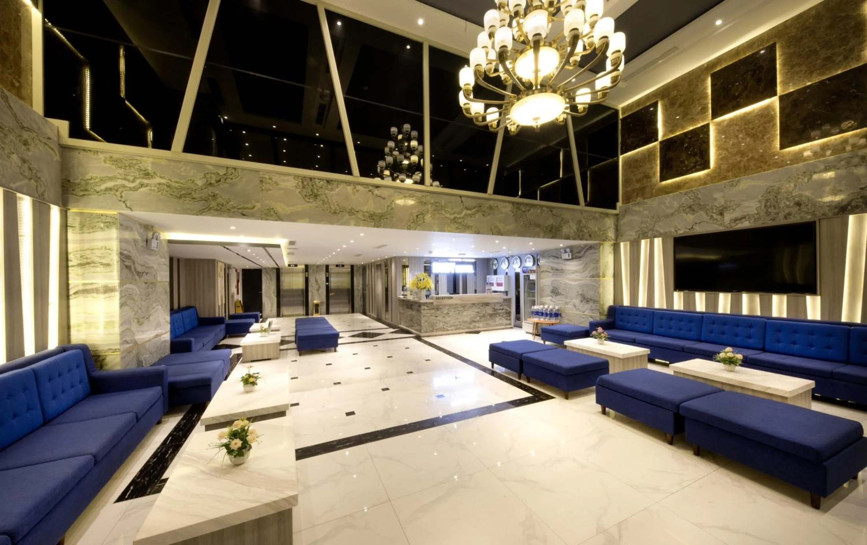 Communal lounge/ TV room in Ruby Luxury Hotel