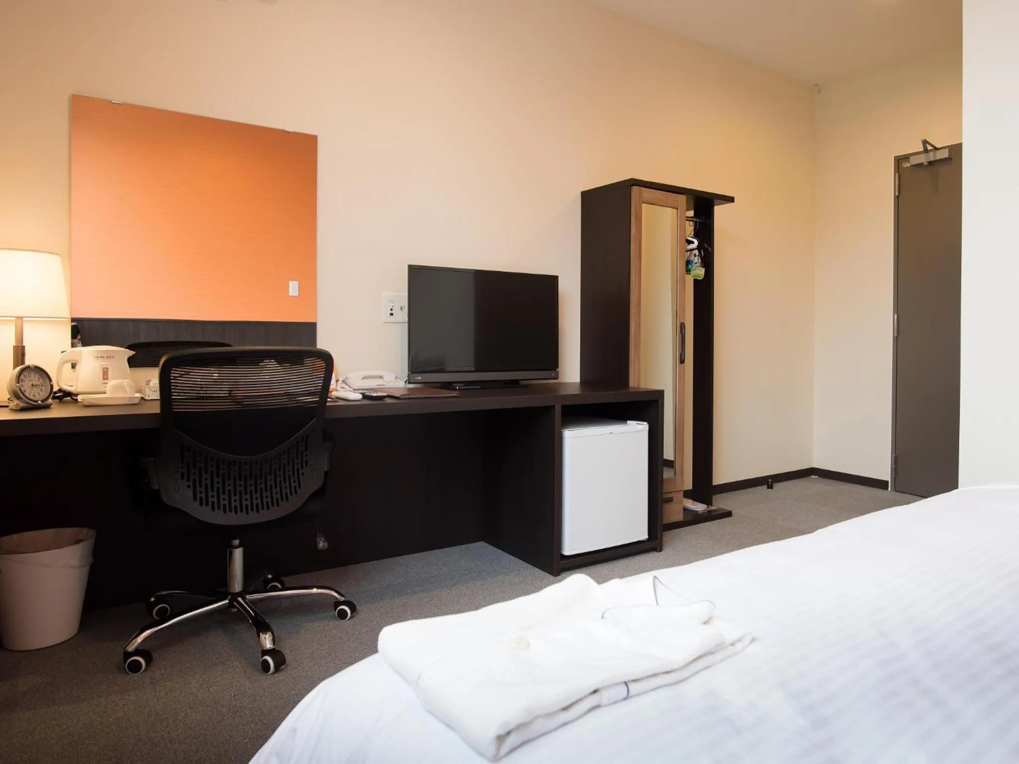 Living room, Bed in Crown Hotel Okinawa Annex