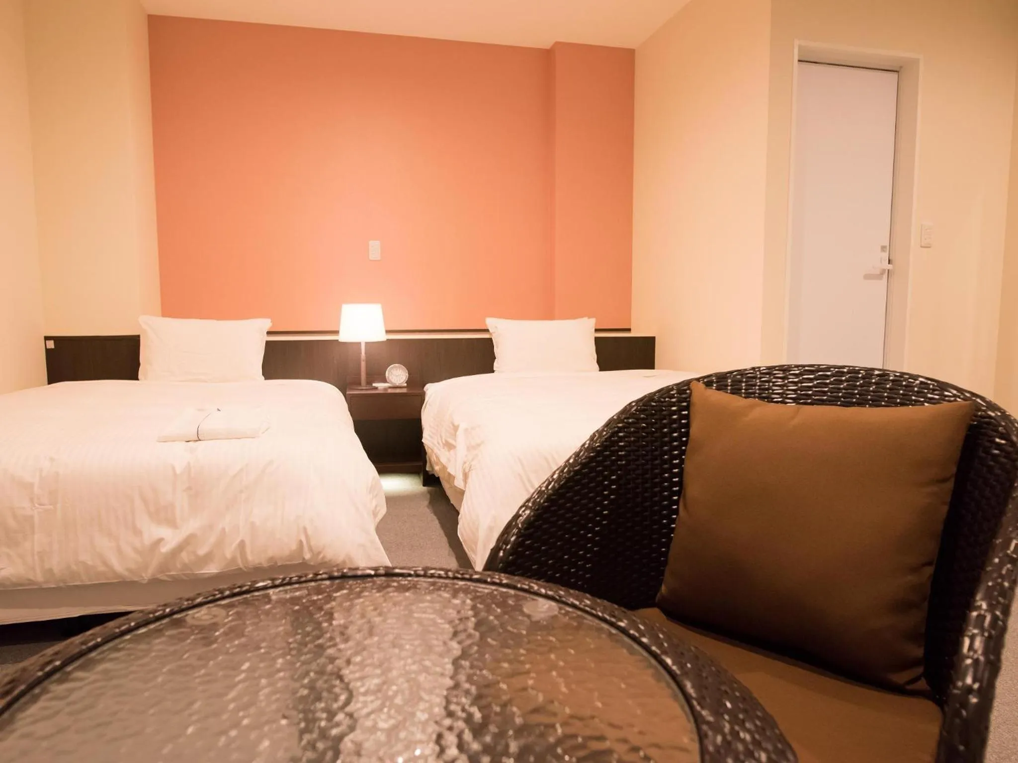 Bedroom, Bed in Crown Hotel Okinawa Annex