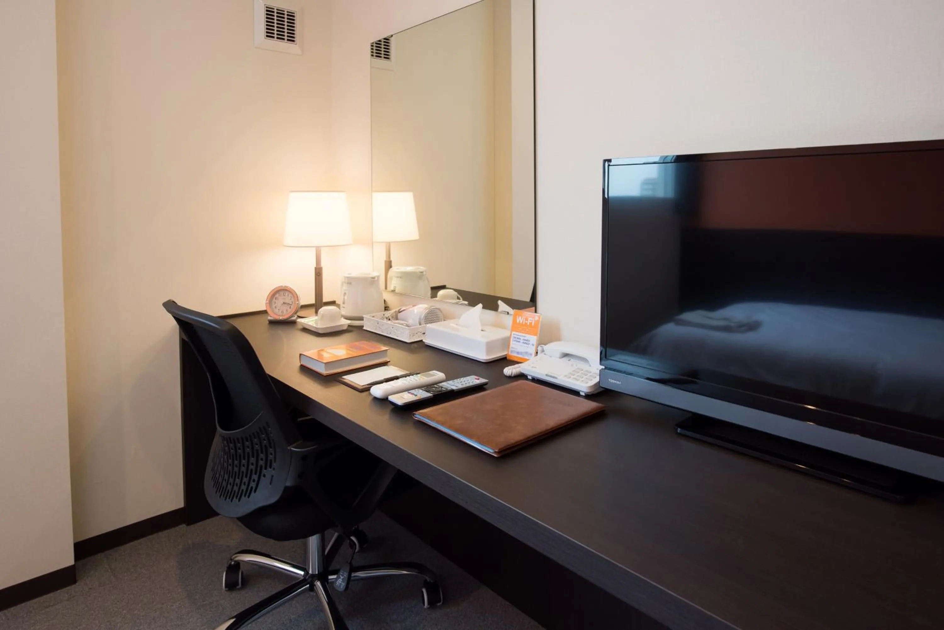 TV and multimedia in Crown Hotel Okinawa Annex