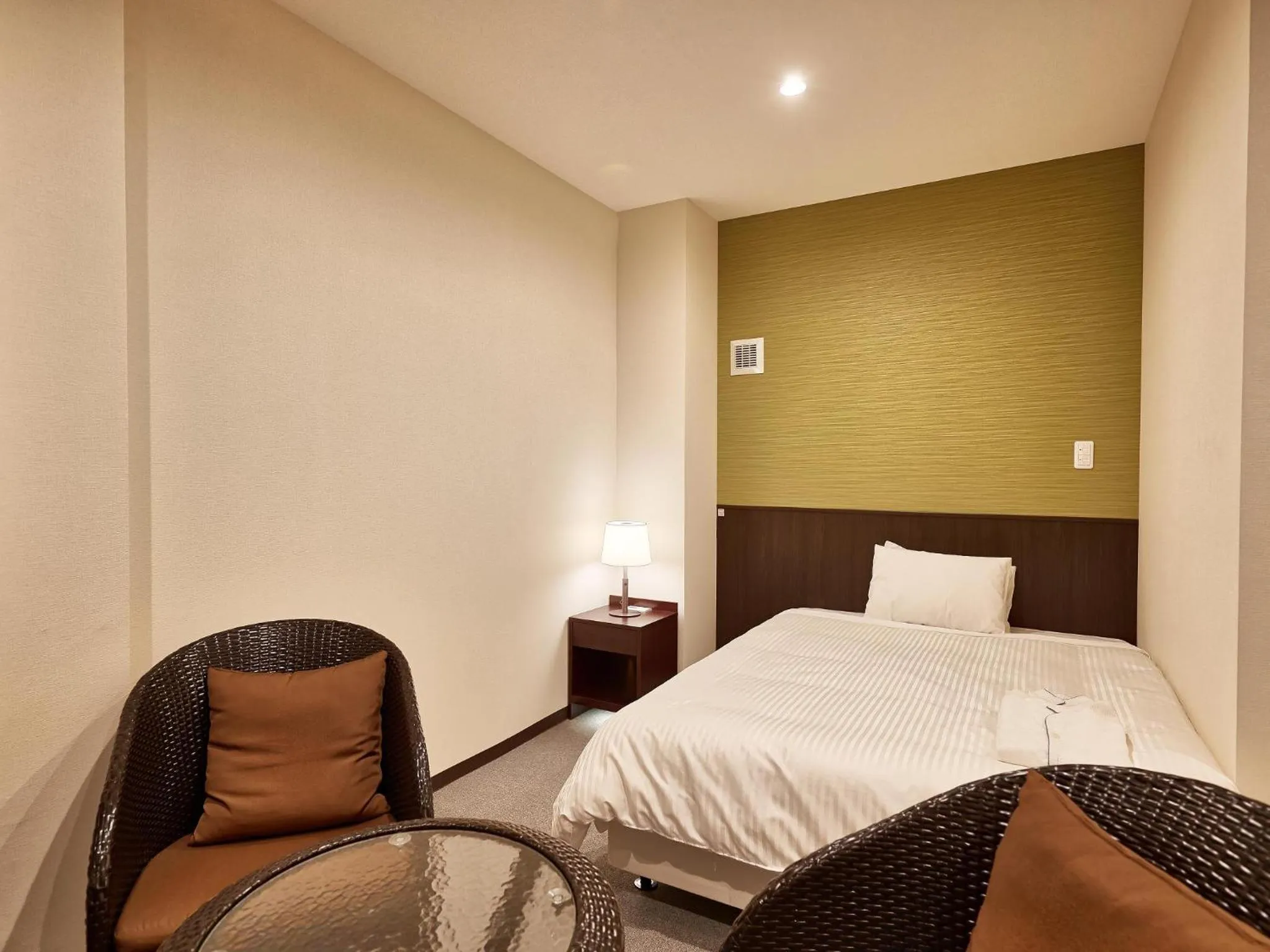 Bedroom, Bed in Crown Hotel Okinawa Annex