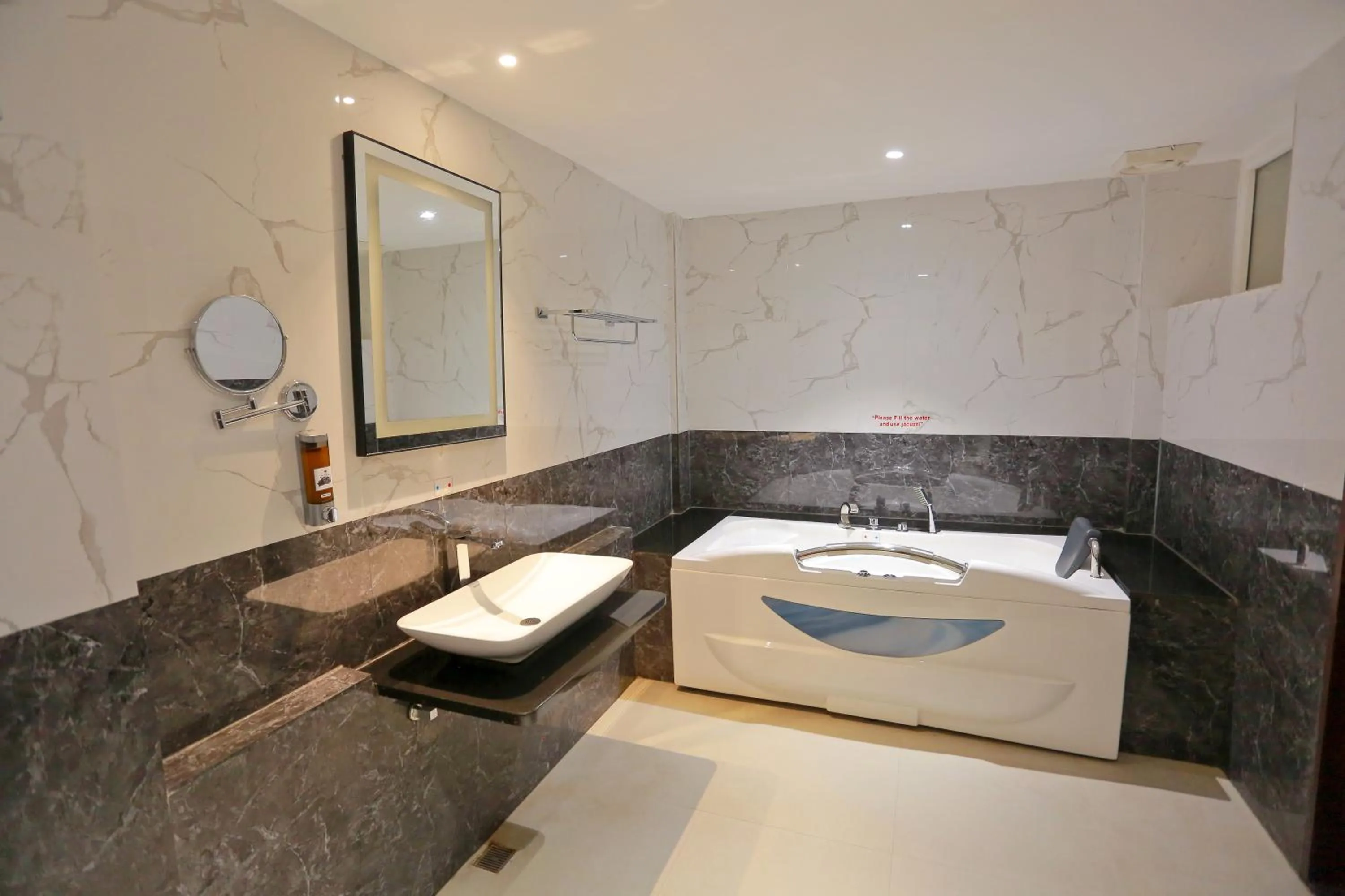 Bathroom in Grand Signature Hotel & spa