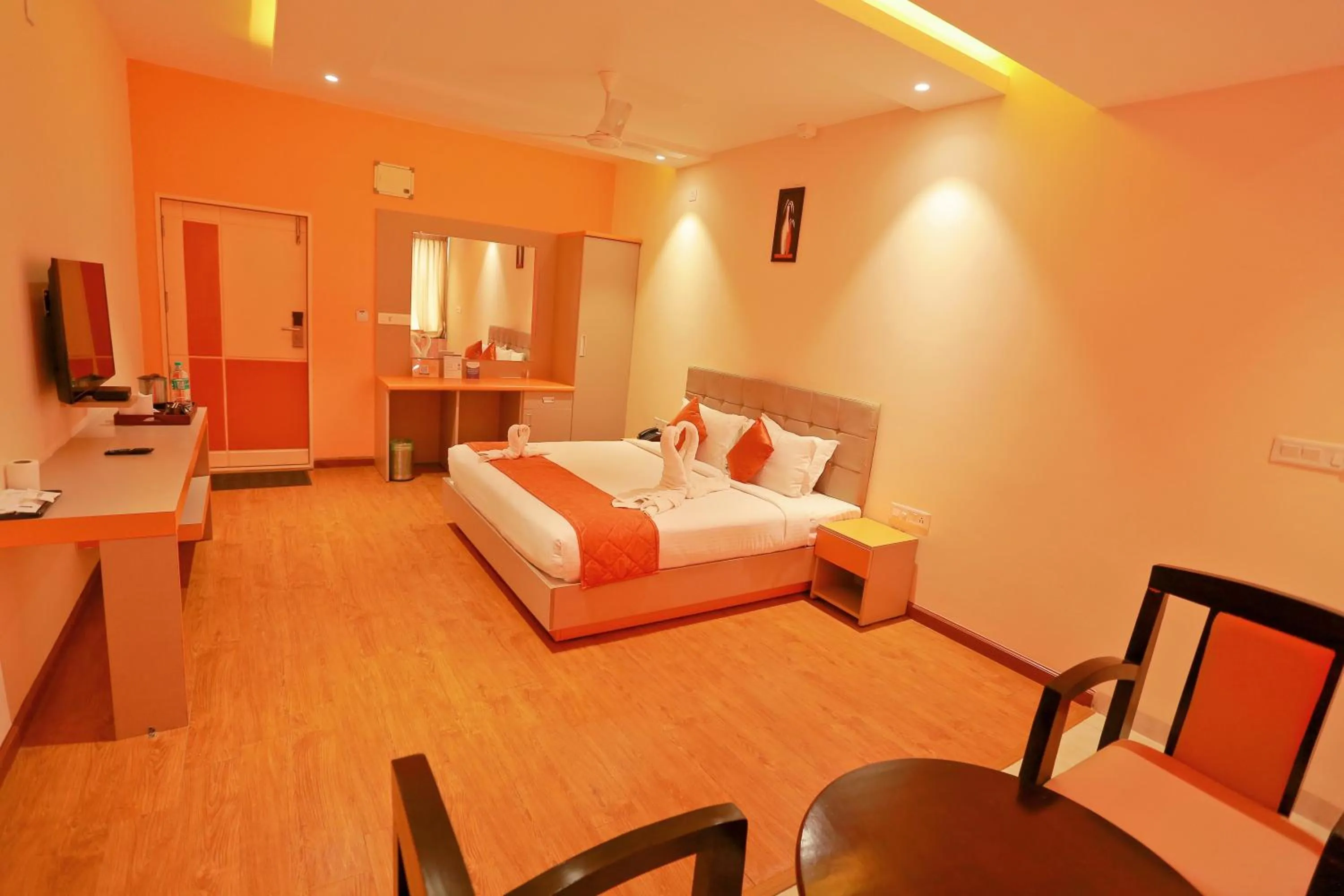 Bed in Grand Signature Hotel & spa