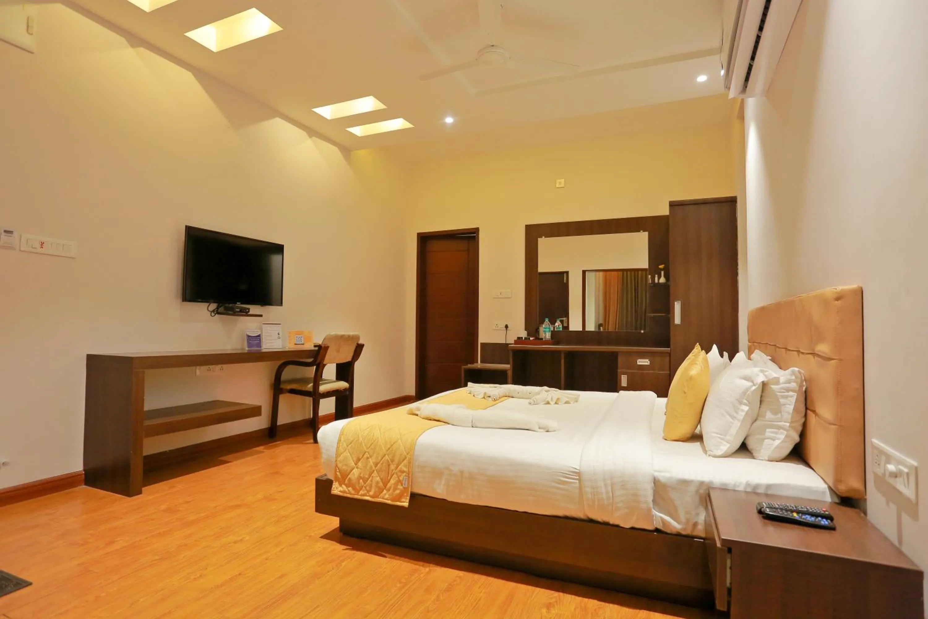 Bed in Grand Signature Hotel & spa