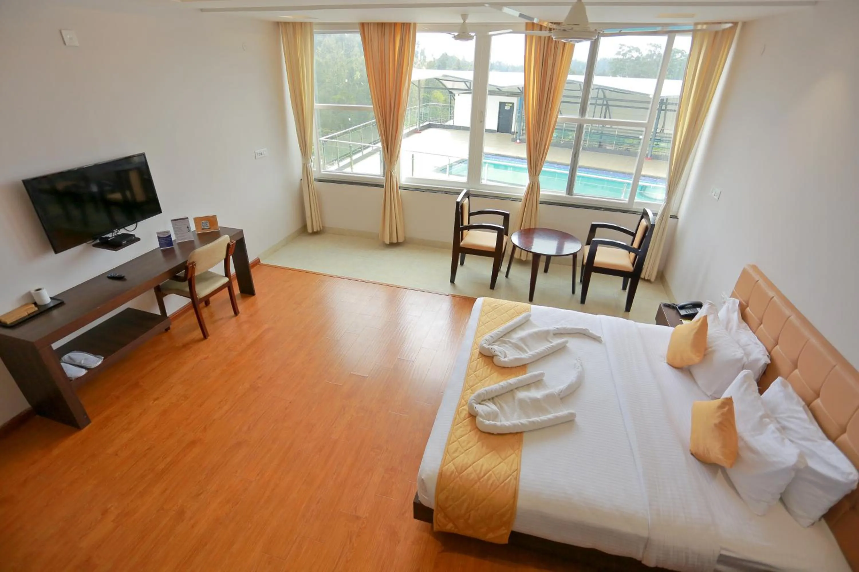 Bed in Grand Signature Hotel & spa