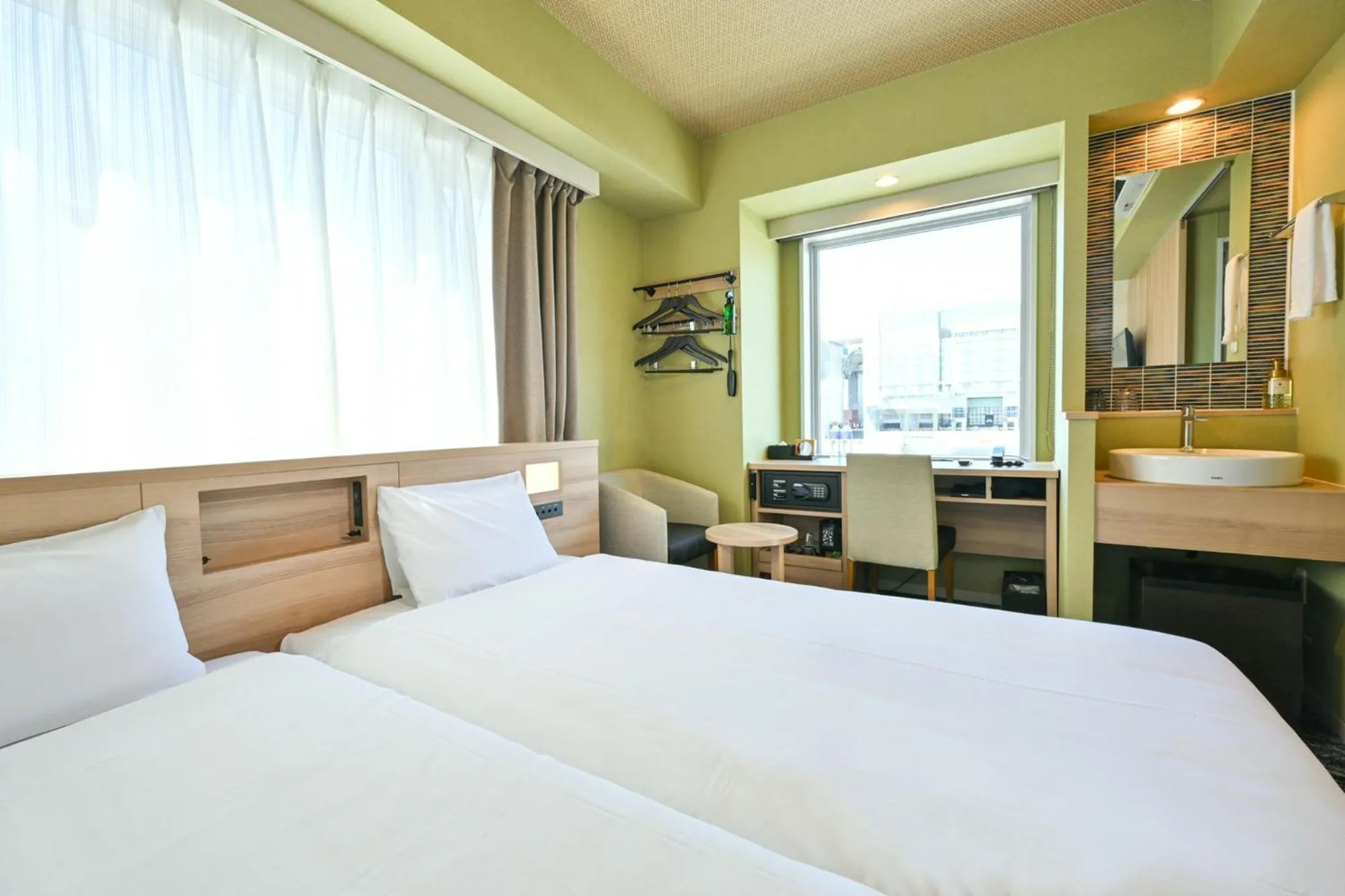 Bed in Sanco Inn Kyoto Hachijoguchi Shikinoyu