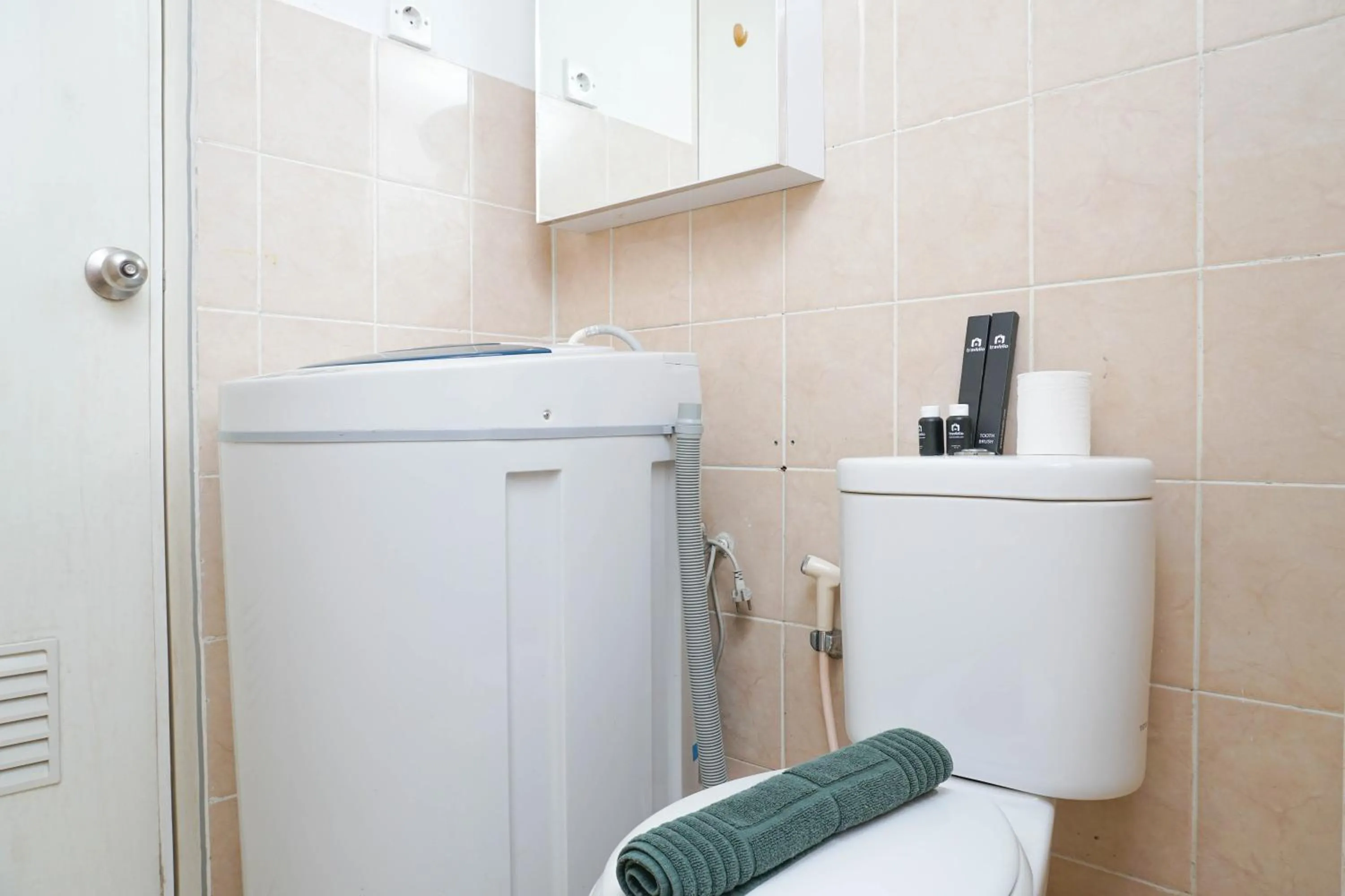 Spacious 2BR Green Bay Pluit Apartment By Travelio