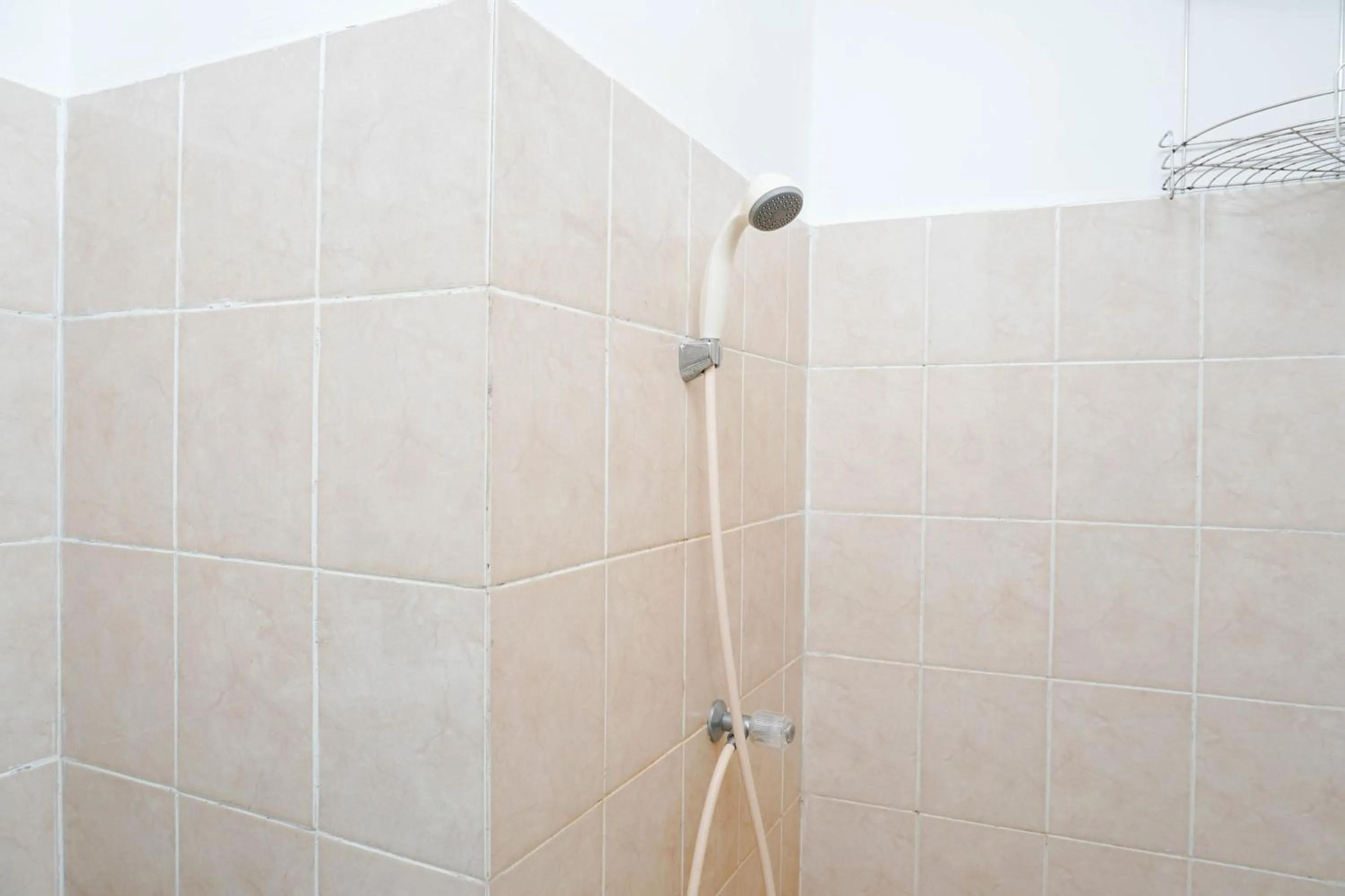 Spacious 2BR Green Bay Pluit Apartment By Travelio