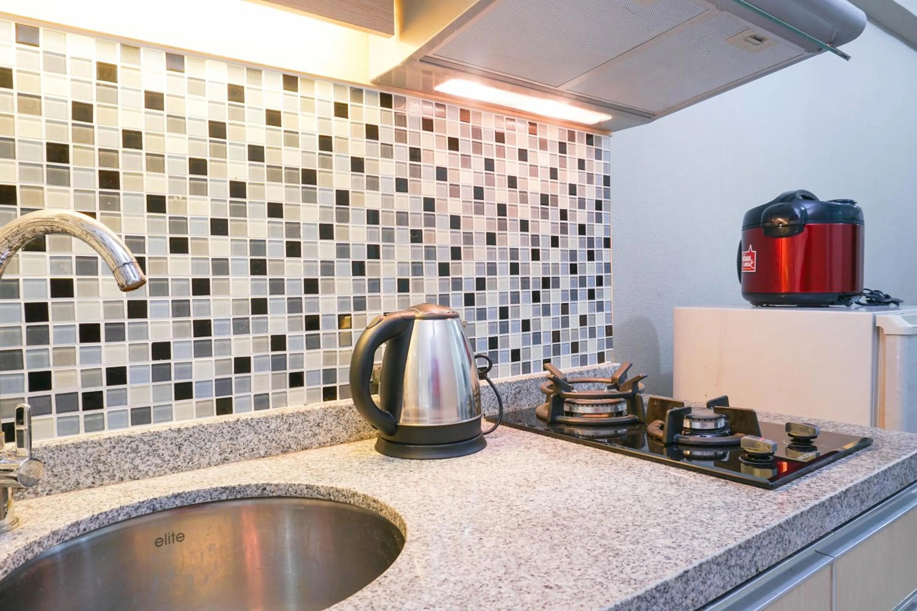 Spacious 2BR Green Bay Pluit Apartment By Travelio