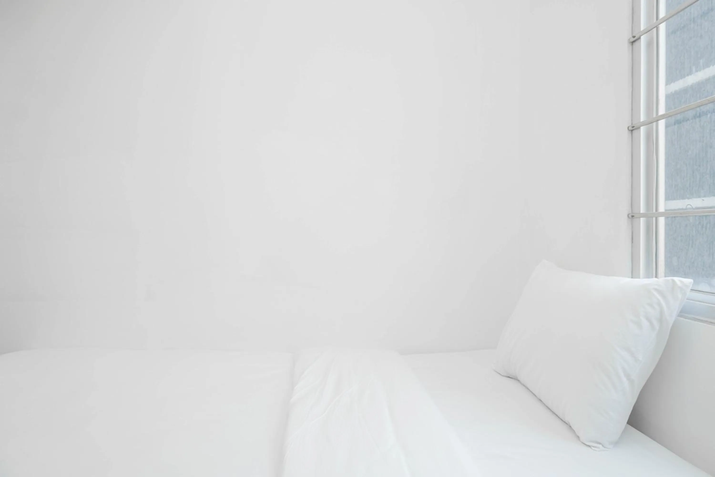 Bed in Spacious 2BR Green Bay Pluit Apartment By Travelio