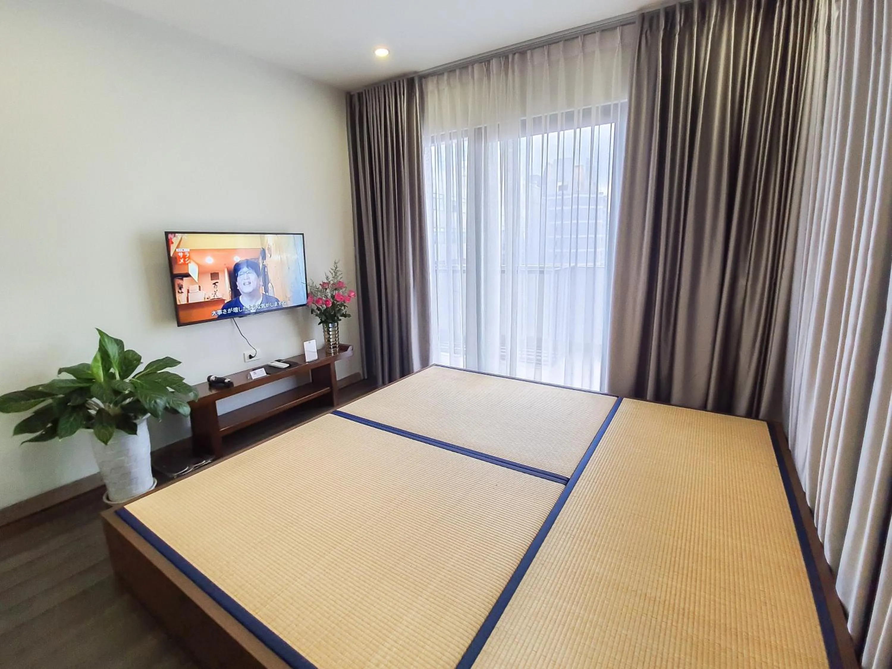 Living room, Bed in REIWA INN APARTMENT