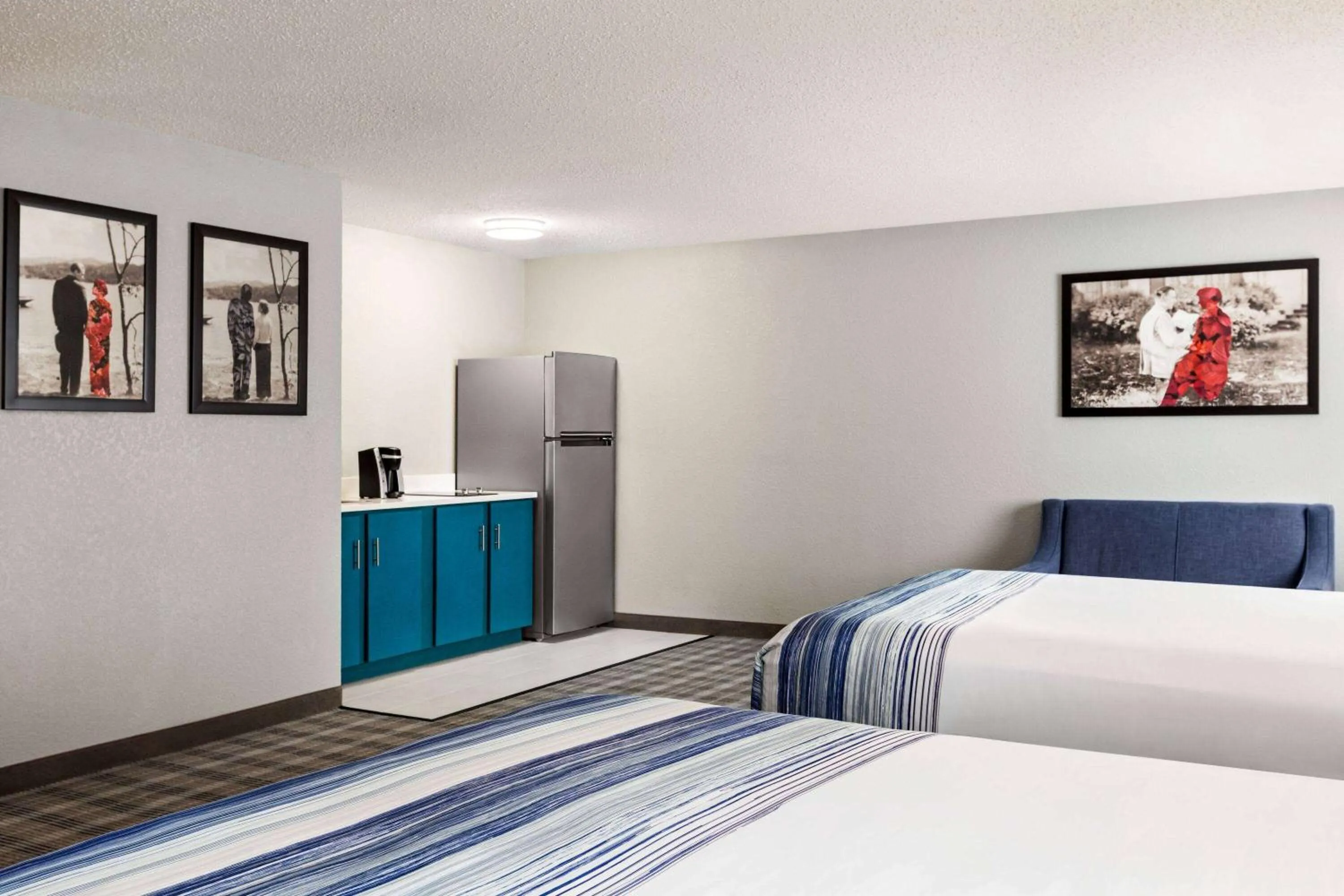 Photo of the whole room, Bed in AmericInn by Wyndham Williamsburg