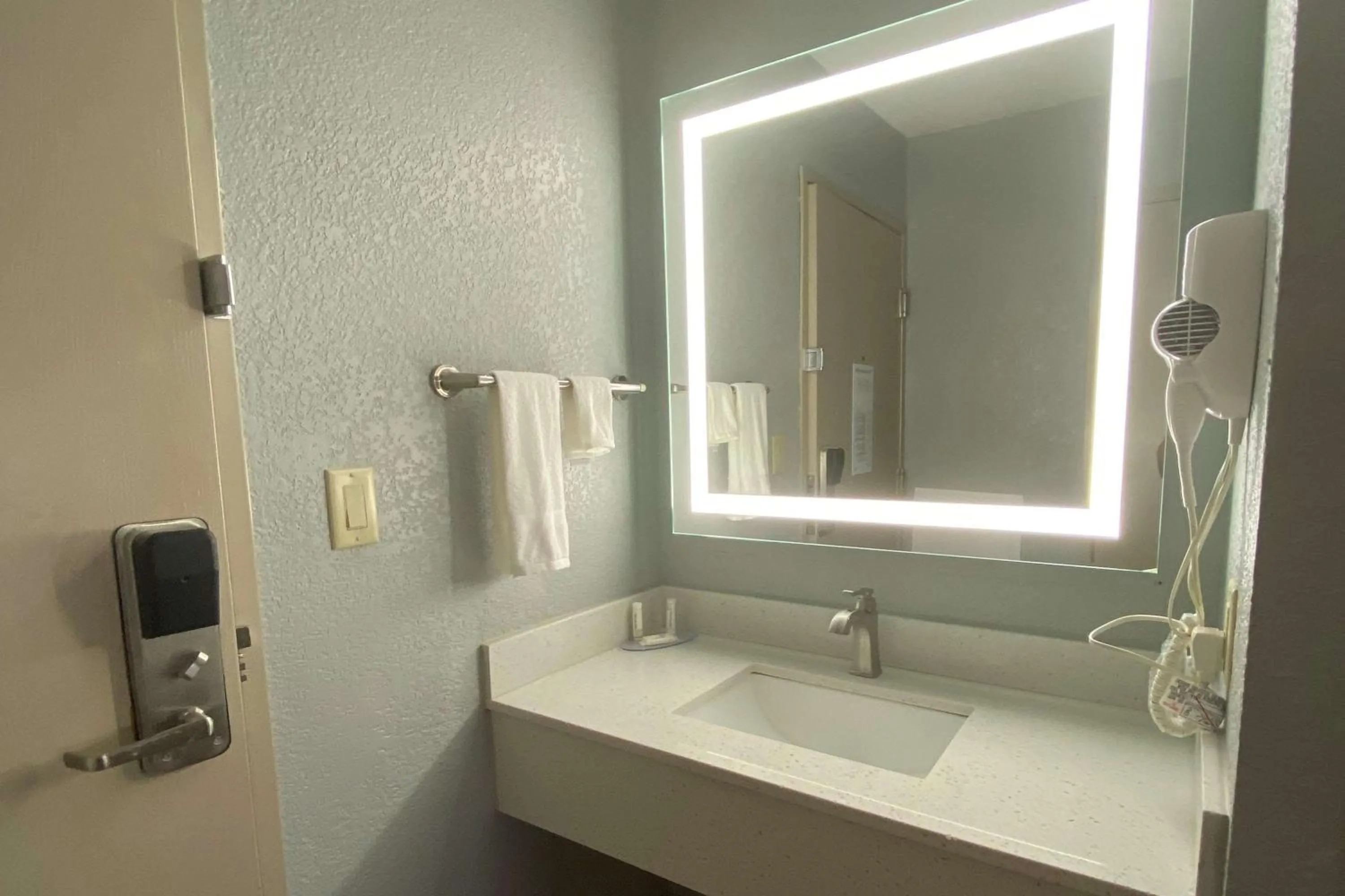 Bathroom in AmericInn by Wyndham Williamsburg