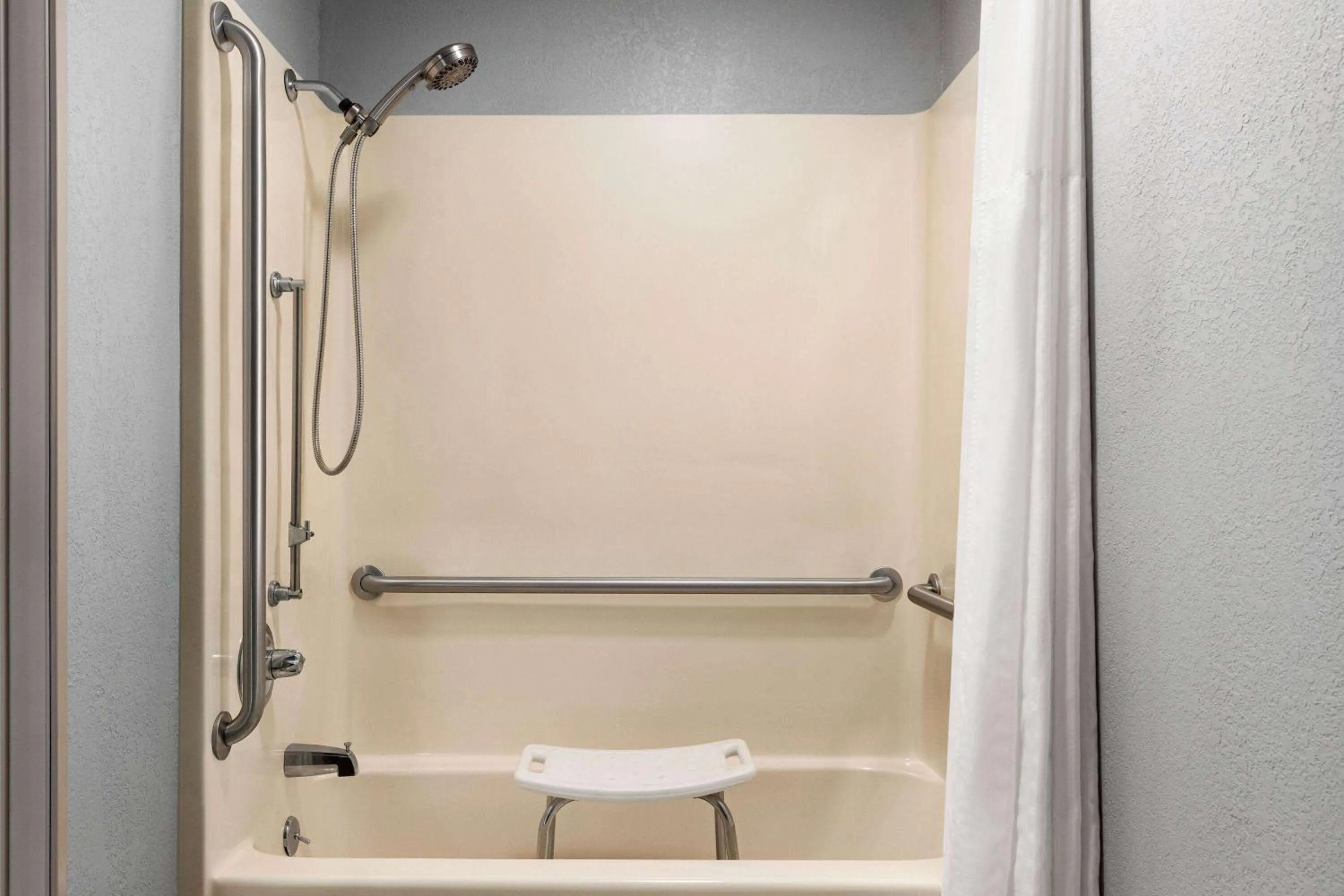 Shower in AmericInn by Wyndham Williamsburg