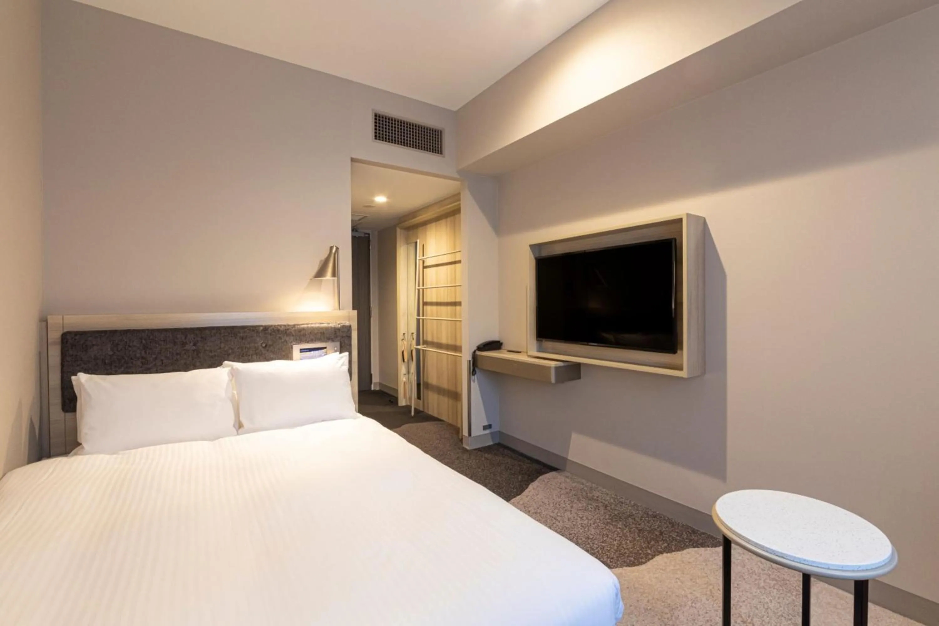 Bed in Hotel Keihan Nagoya