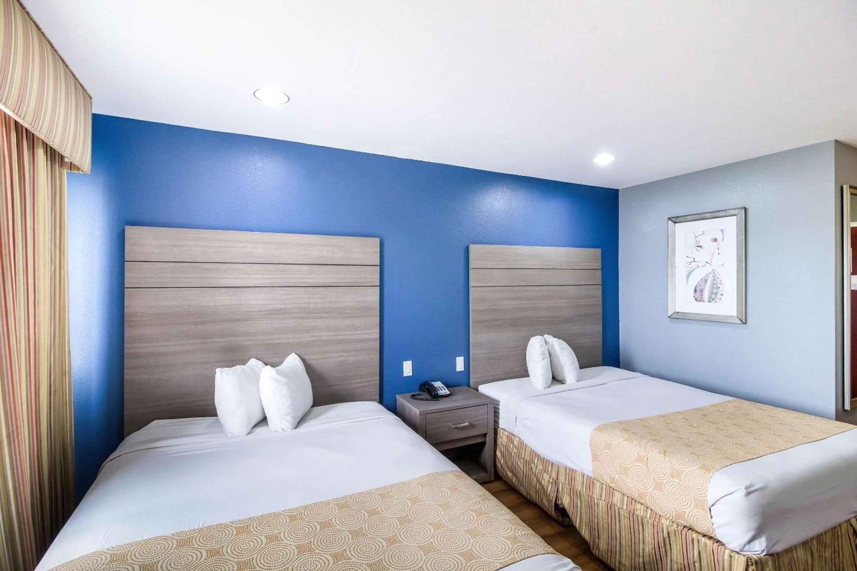 Bedroom, Bed in Rodeway Inn & Suites Port Arthur - Groves