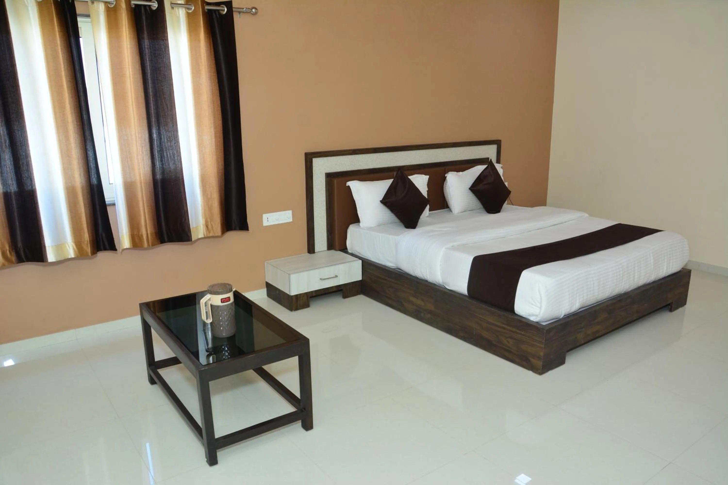 Bed in Hotel Savera Palace