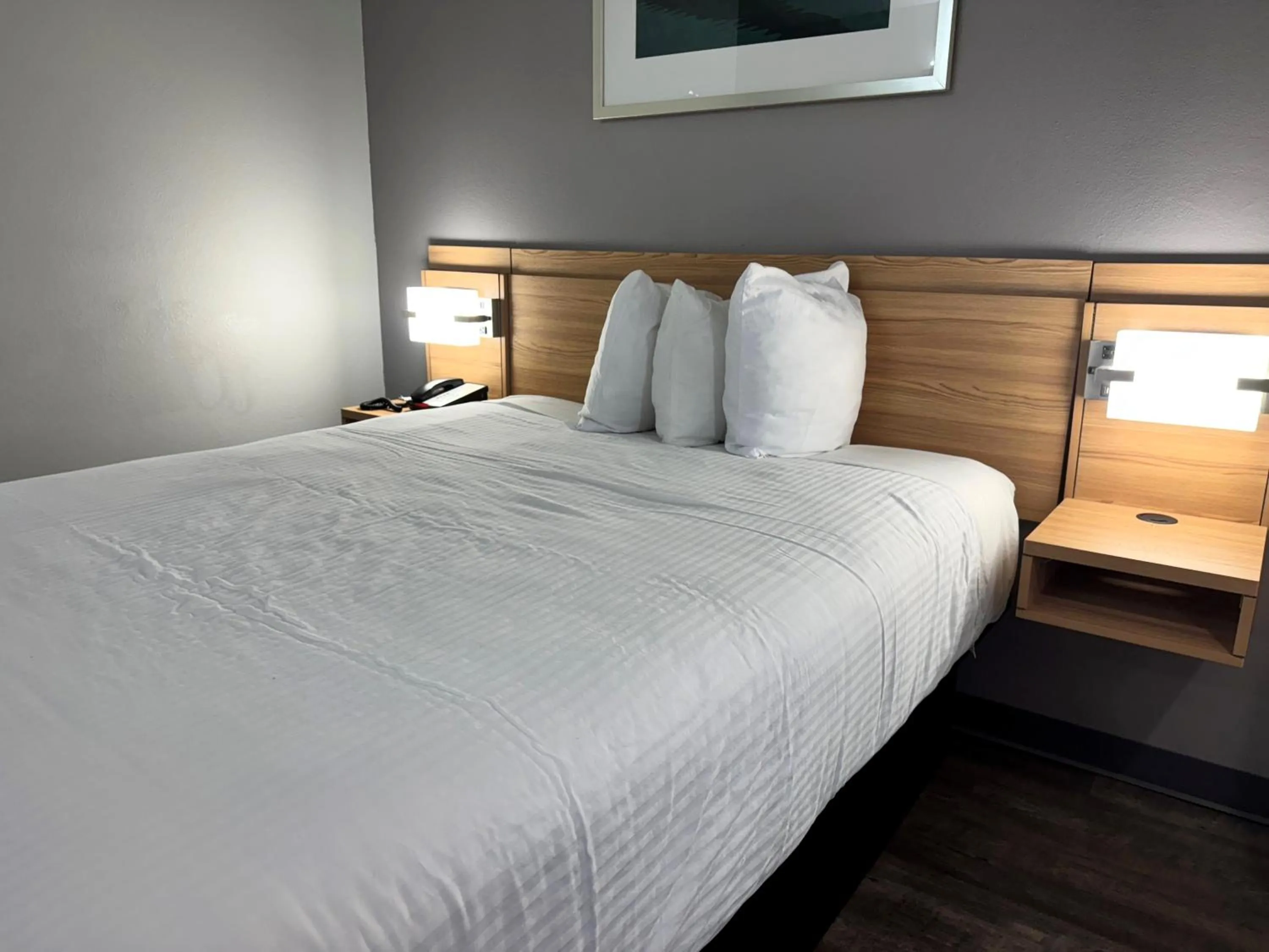 Bed in Microtel Inn & Suites by Wyndham Tuscaloosa East