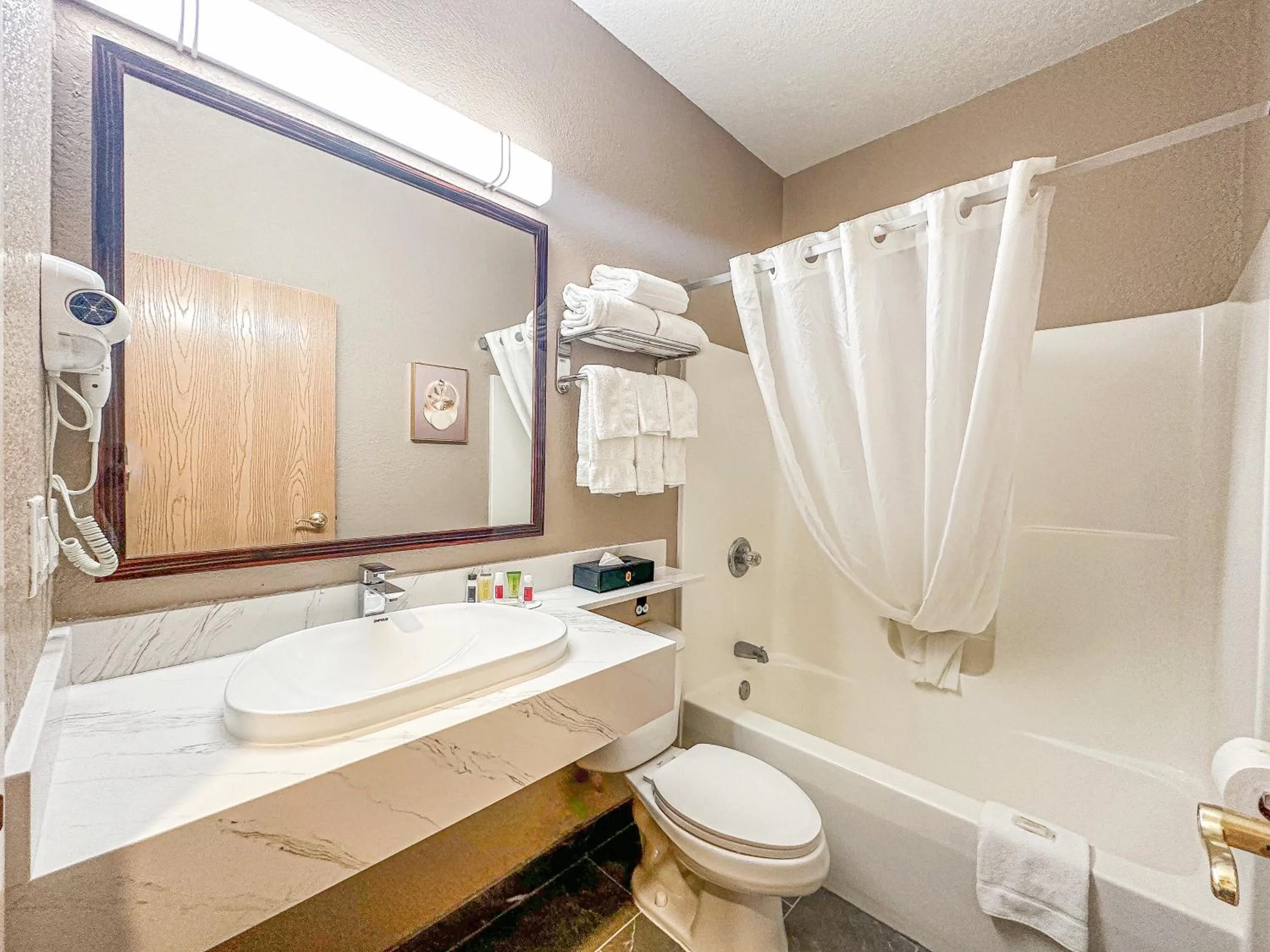 Bathroom in Super 8 by Wyndham Uniontown PA