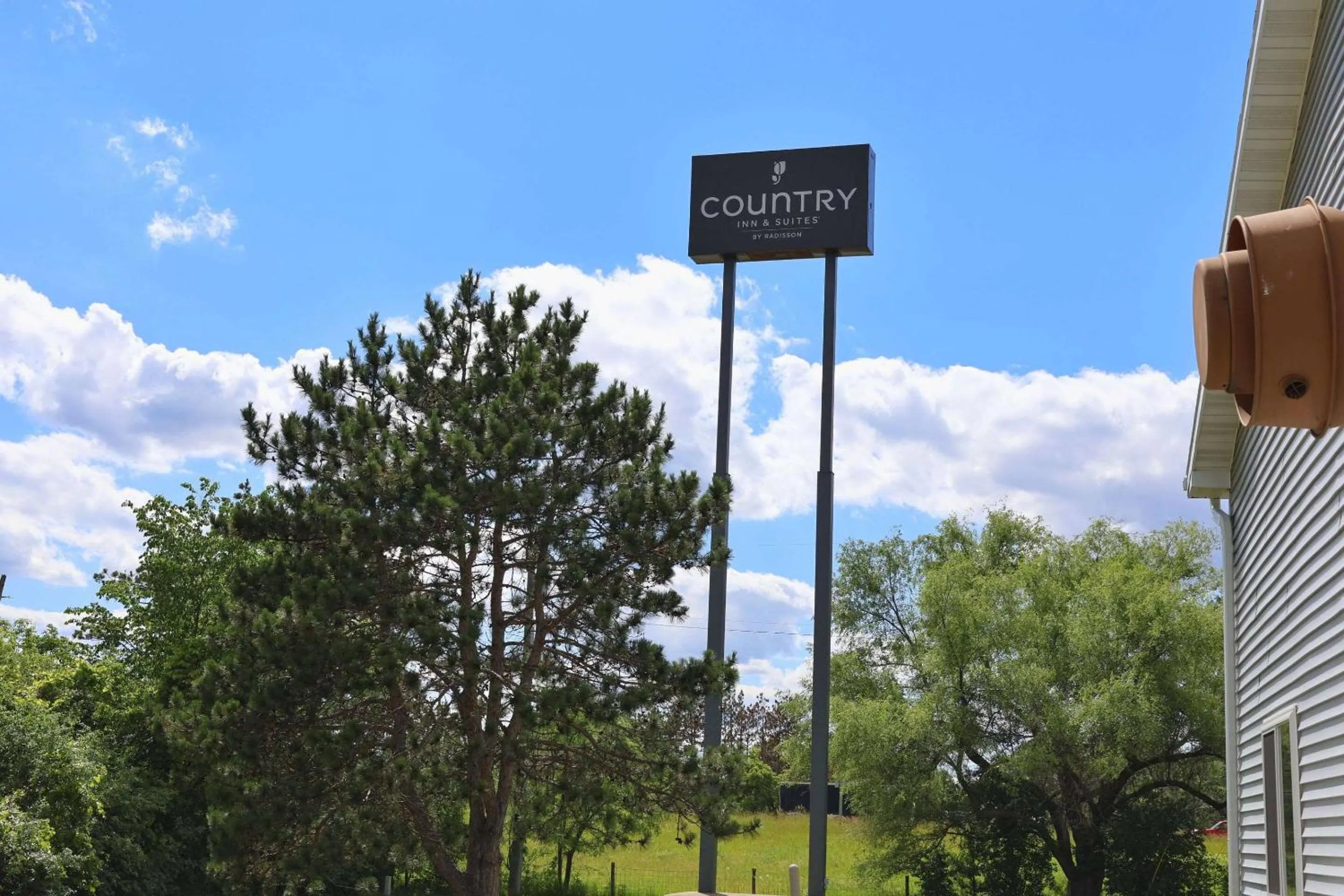 Property building in Country Inn & Suites by Radisson, Sparta, WI
