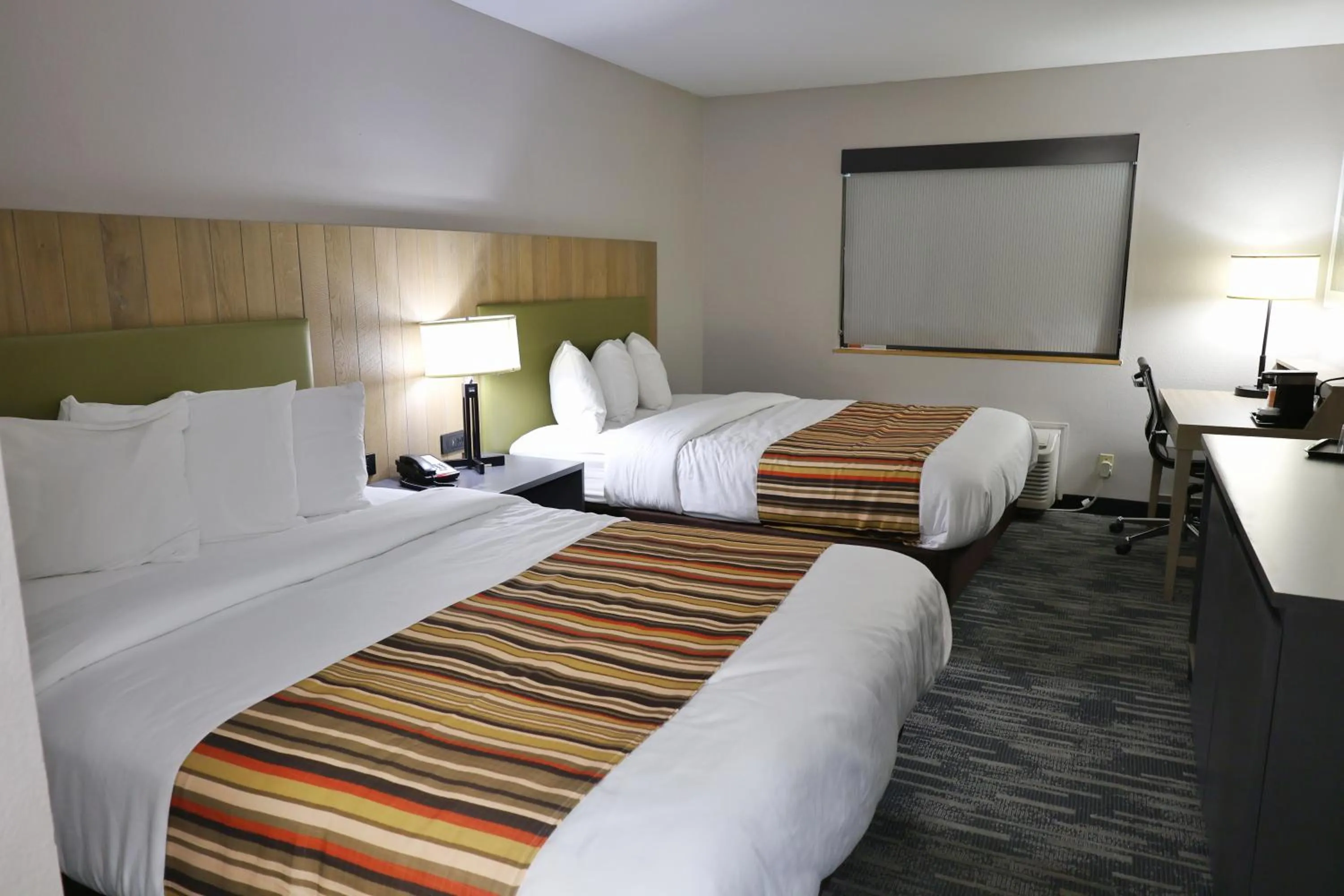 Bed in Country Inn & Suites by Radisson, Sparta, WI