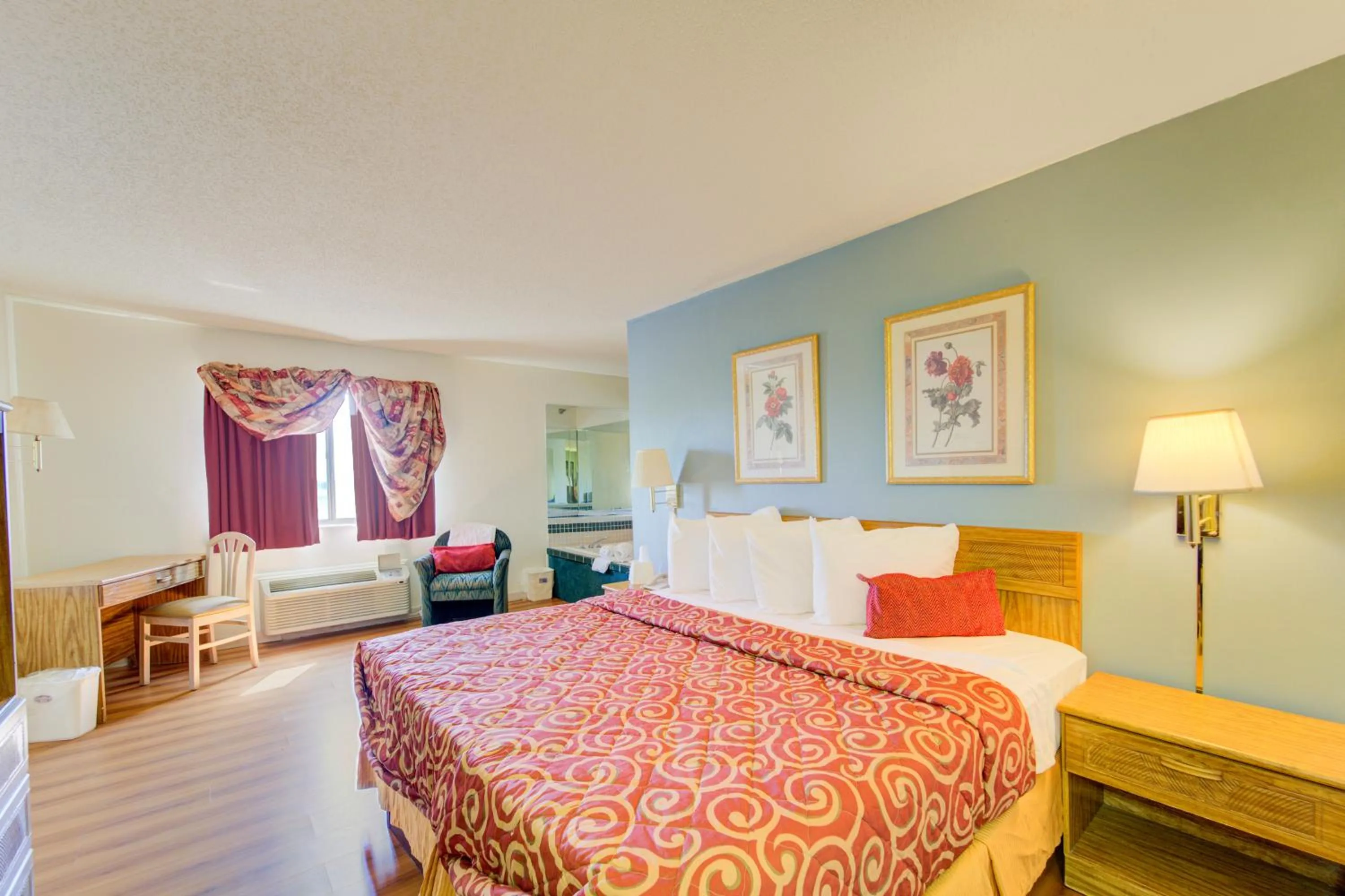 Bedroom, Bed in Capital O Amerihost Inn and Suites Mexico Hwy 54 MO