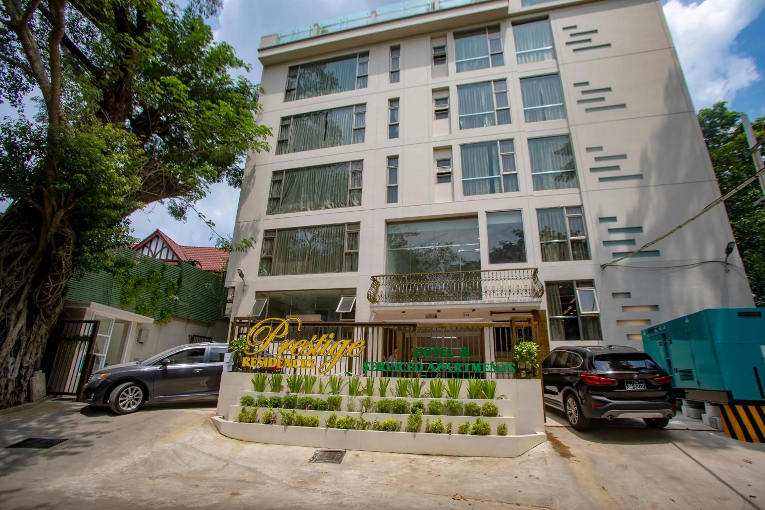 Property building in Prestige Residences at Golden Valley by Grand United Hospitality