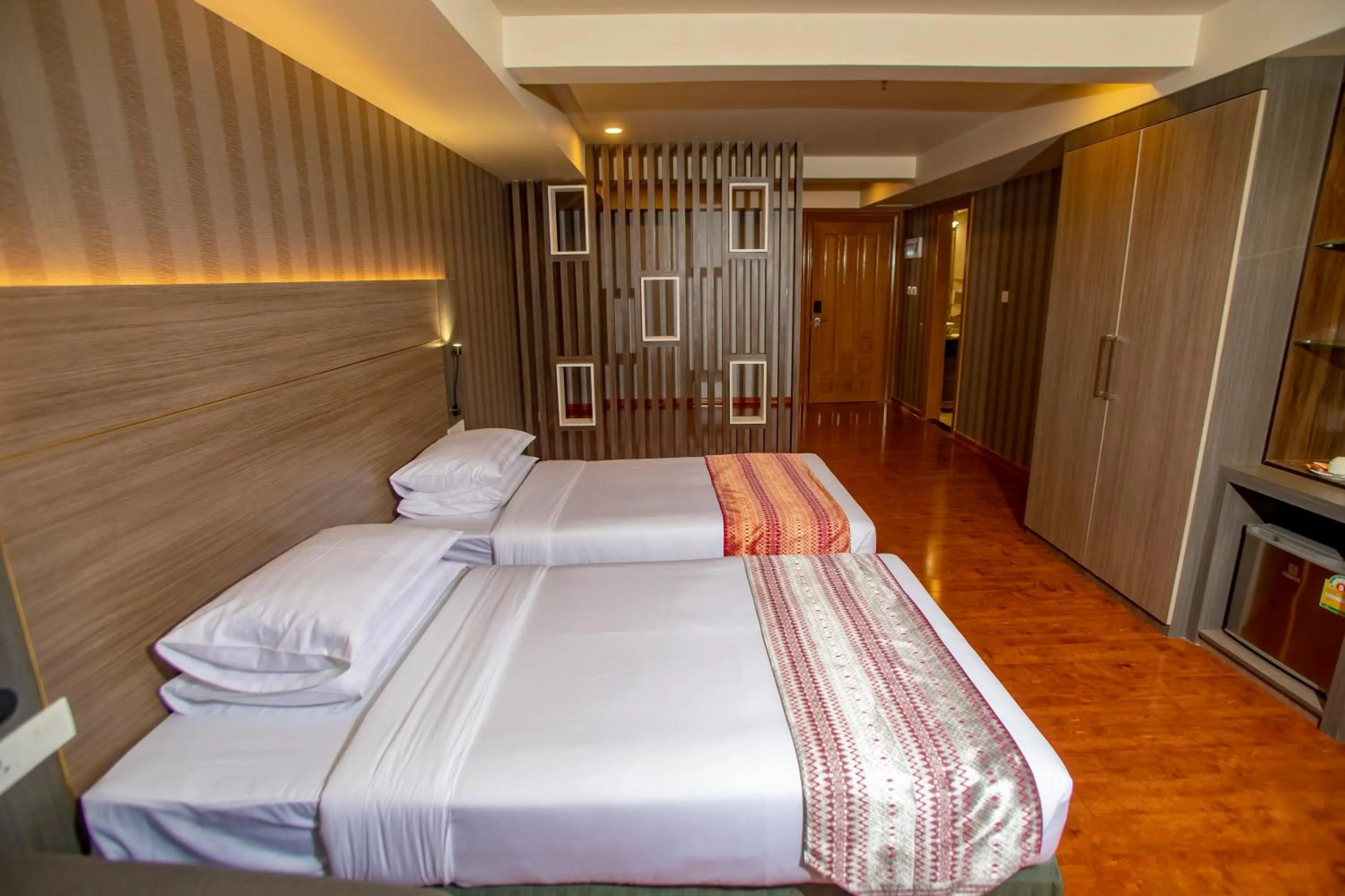 Bed in Prestige Residences at Golden Valley by Grand United Hospitality