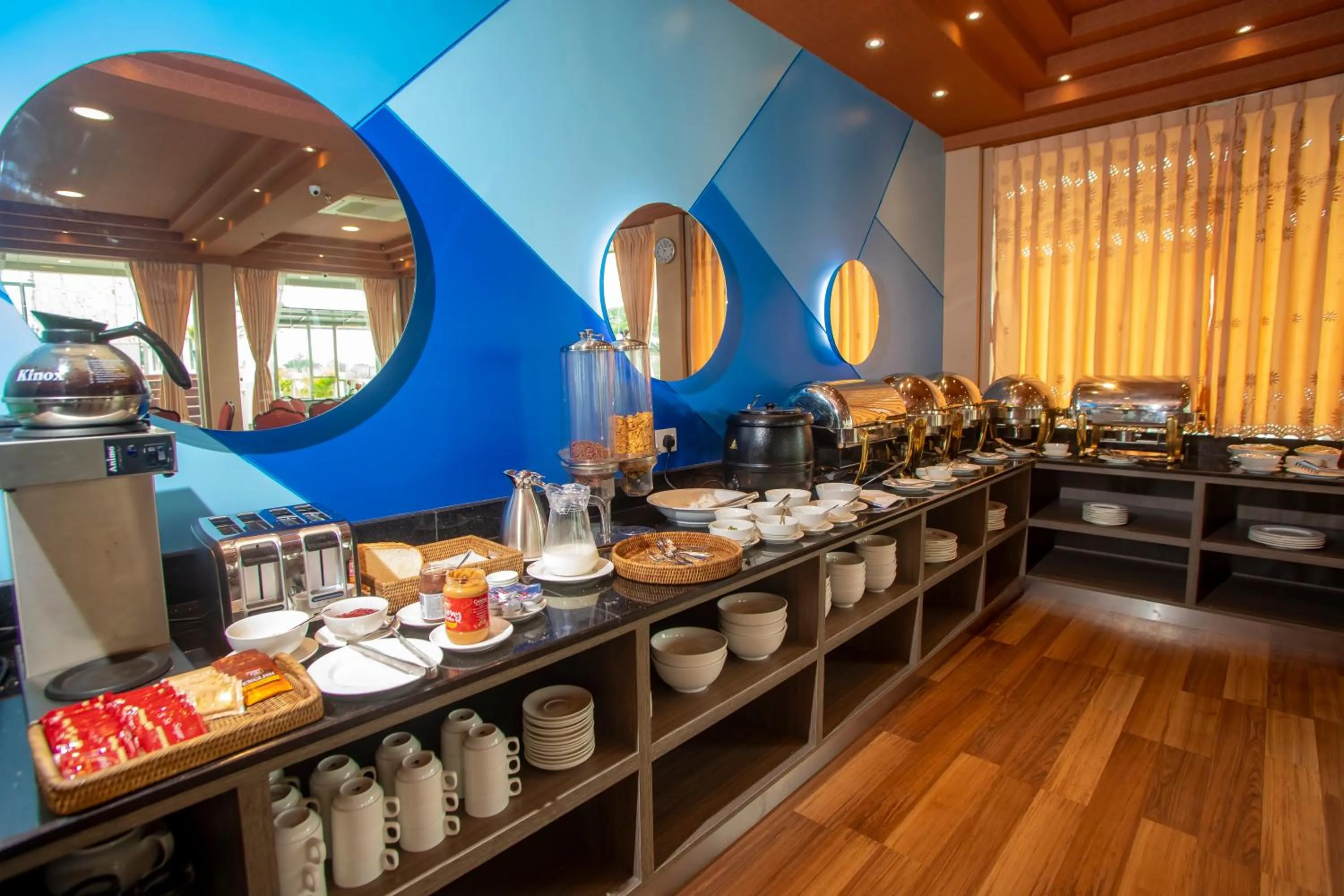Buffet breakfast in Prestige Residences at Golden Valley by Grand United Hospitality