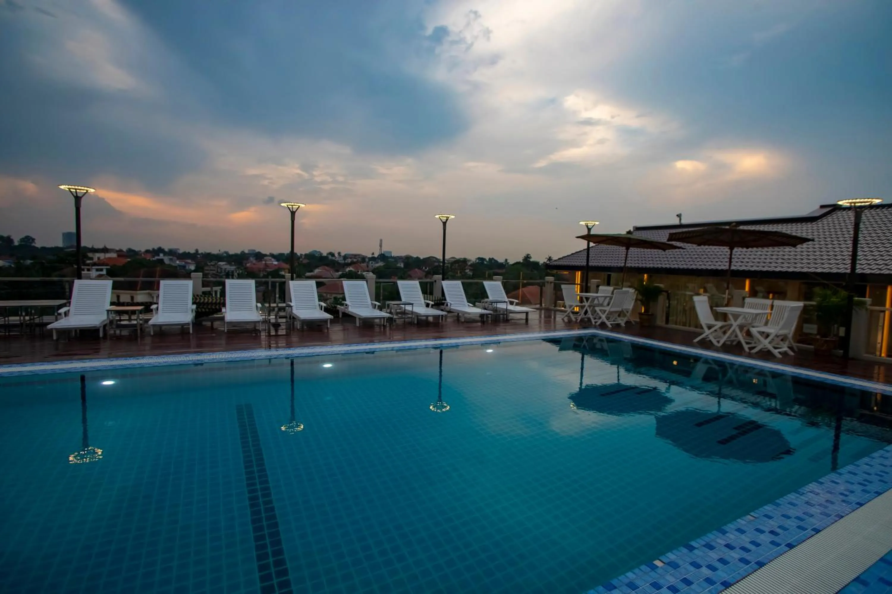 Swimming pool in Prestige Residences at Golden Valley by Grand United Hospitality