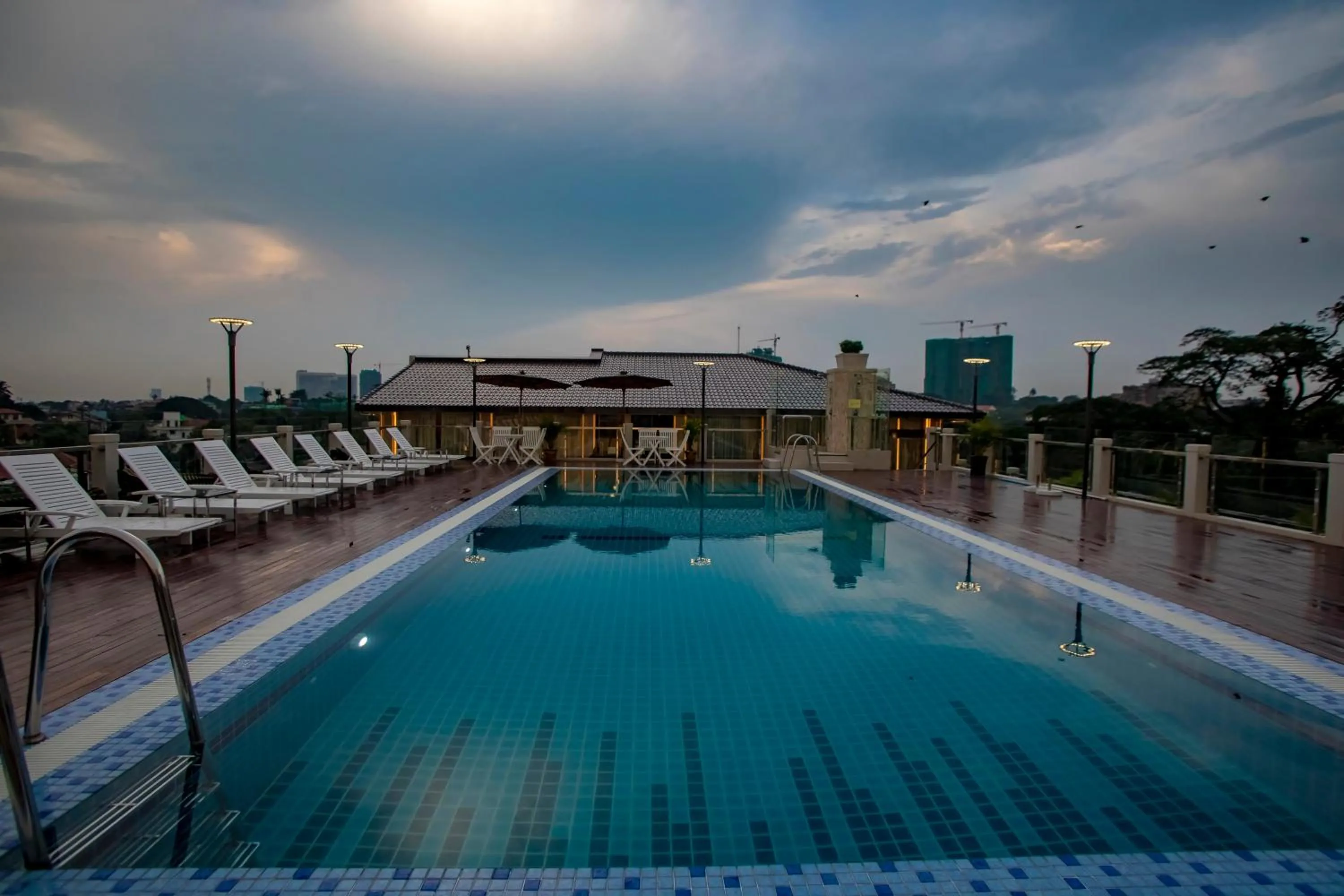 Swimming pool in Prestige Residences at Golden Valley by Grand United Hospitality