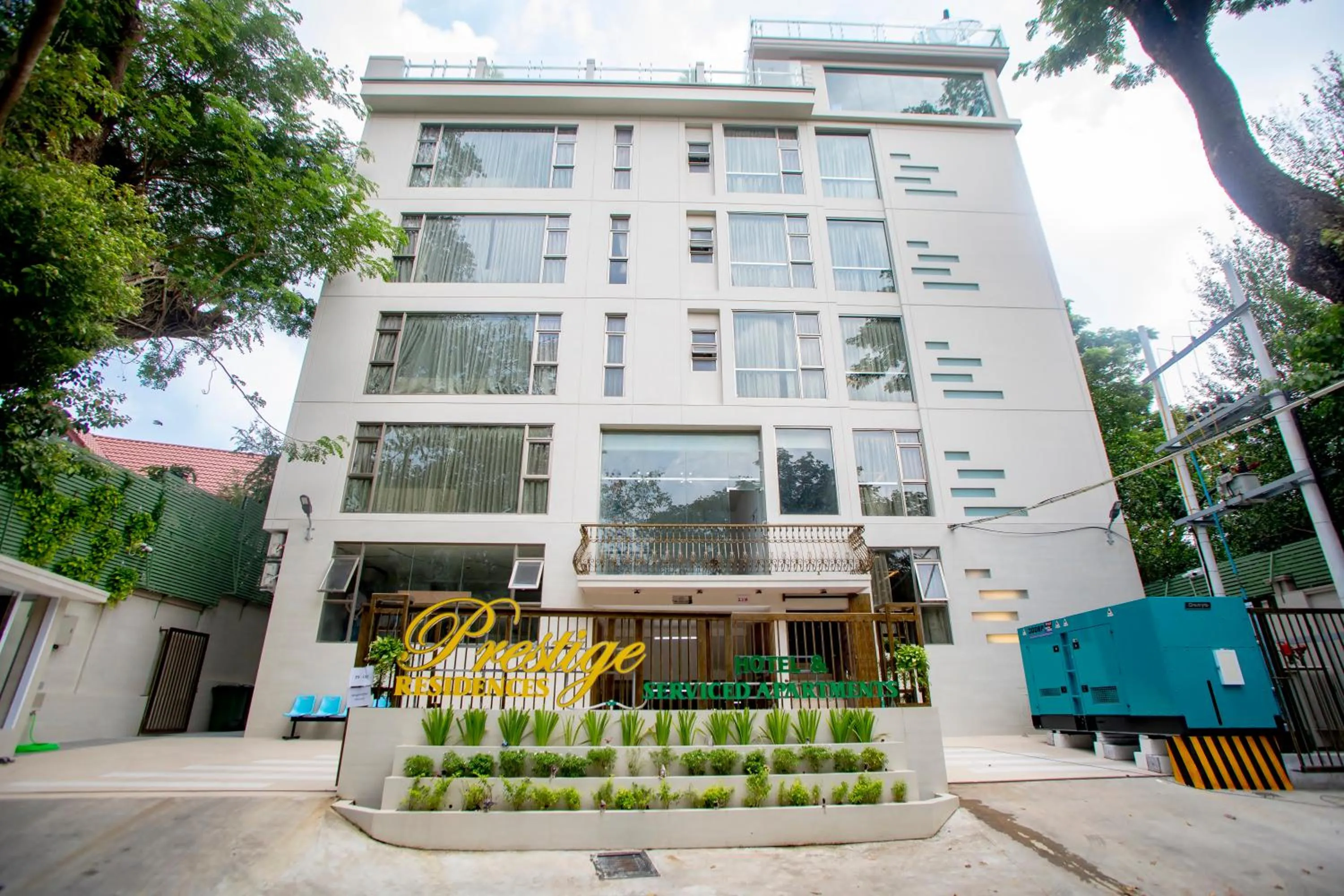 Property building in Prestige Residences at Golden Valley by Grand United Hospitality