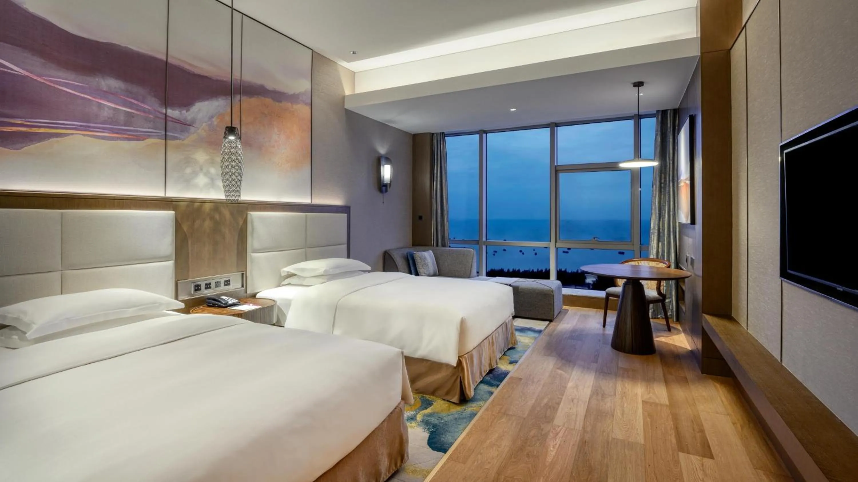 Photo of the whole room, Bed in Crowne Plaza Beihai Silver Beach by IHG