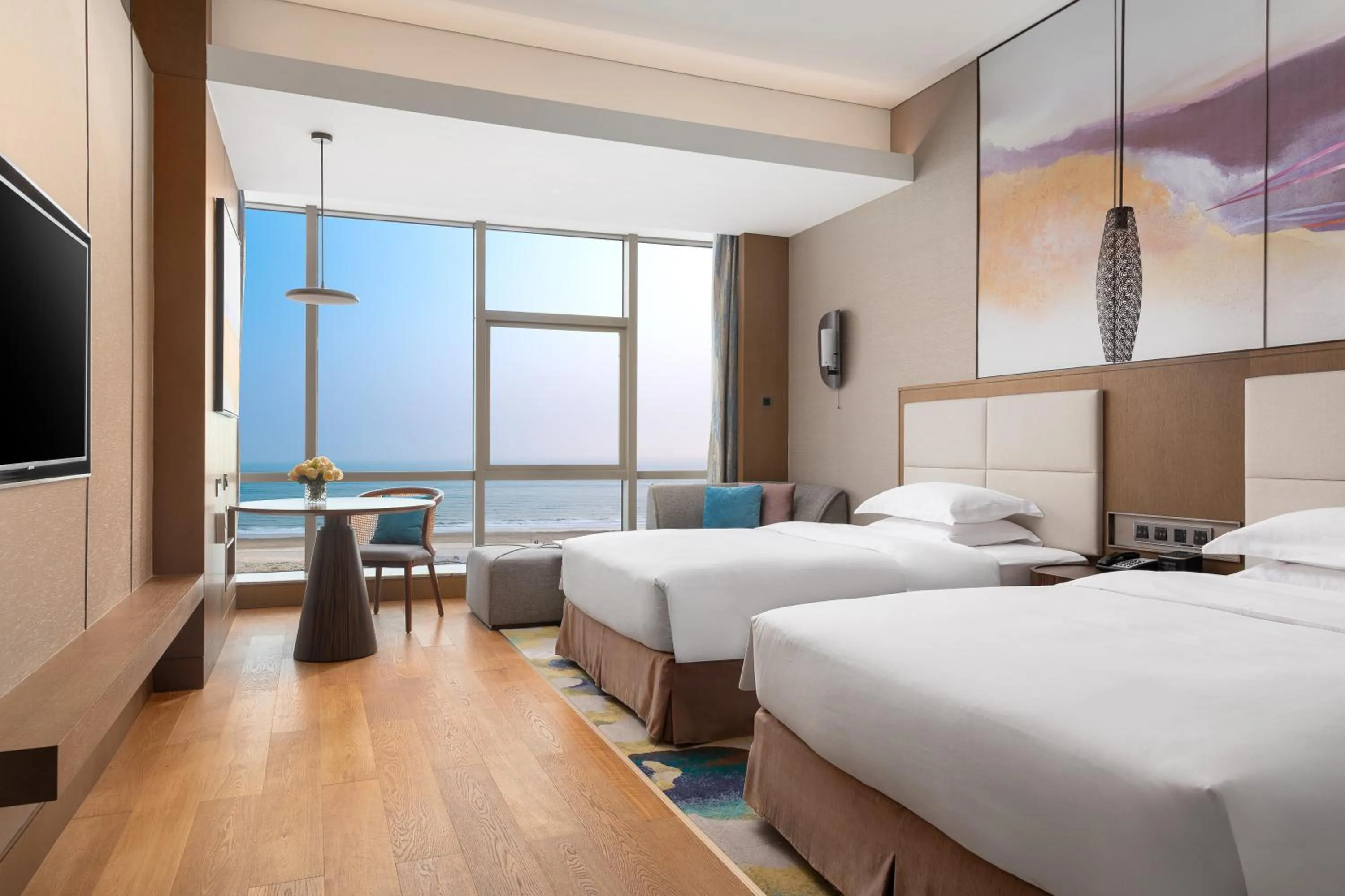 Photo of the whole room, Bed in Crowne Plaza Beihai Silver Beach by IHG