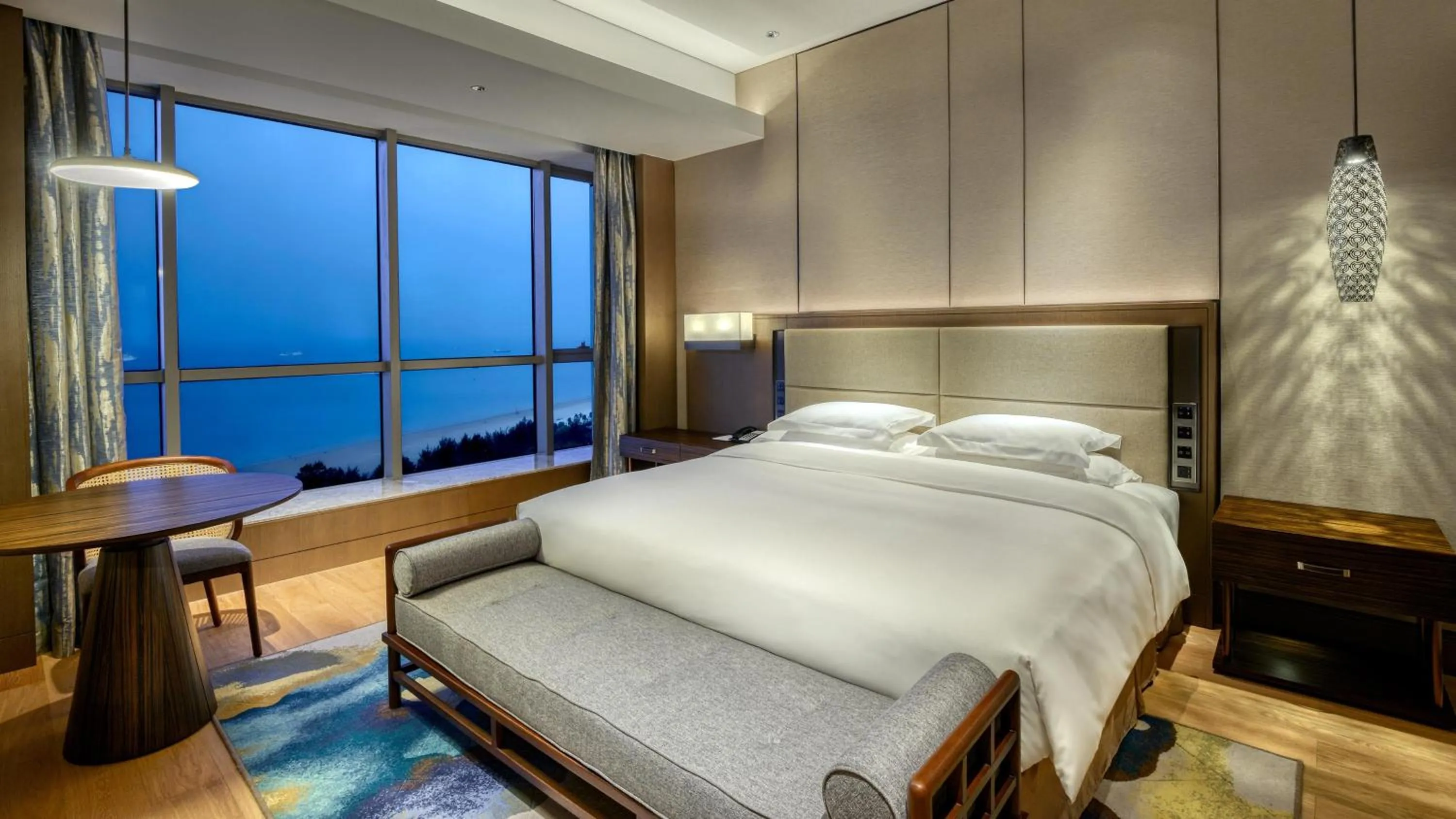 Photo of the whole room, Bed in Crowne Plaza Beihai Silver Beach by IHG