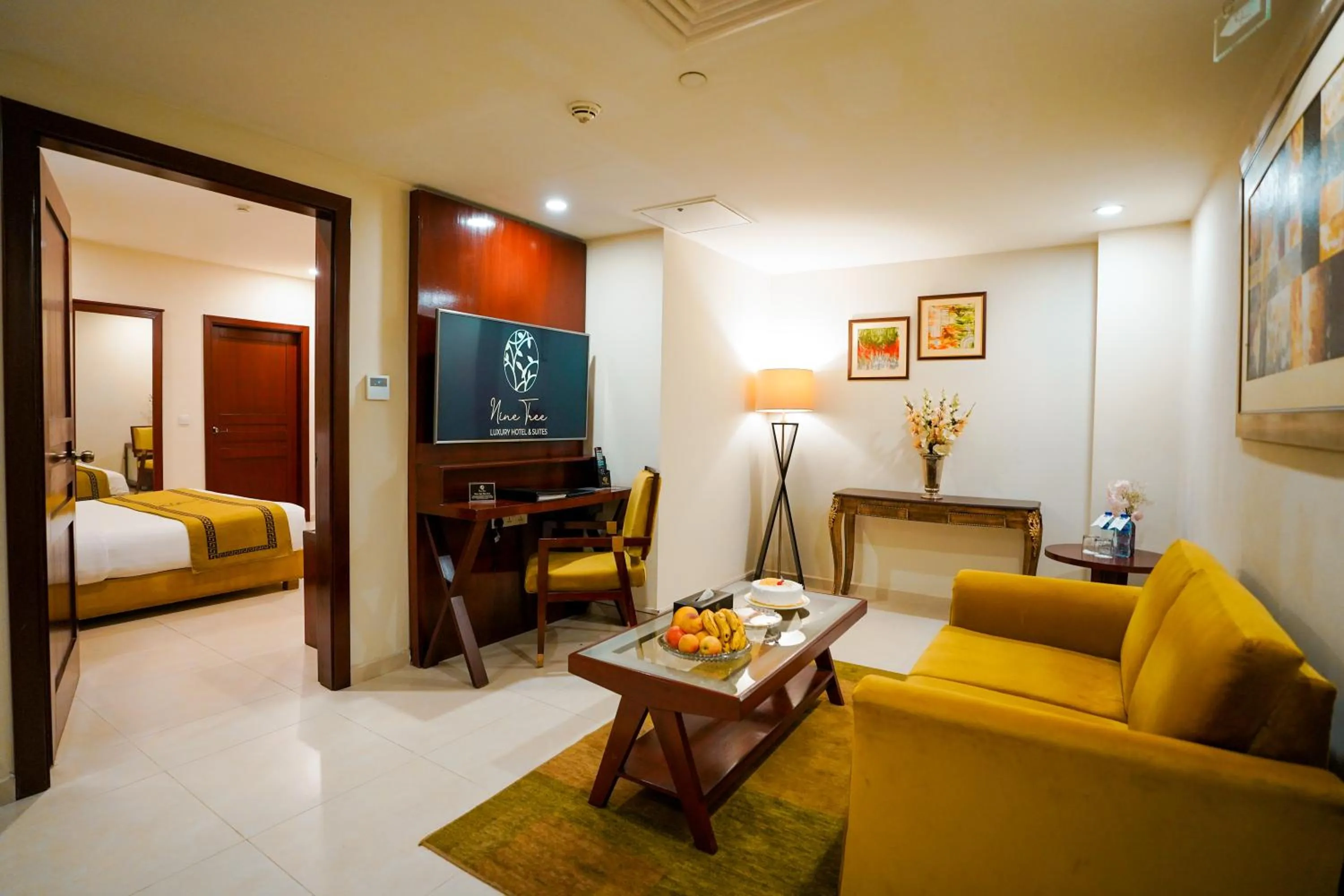 Living room, Bed in Nine Tree Luxury Hotel & Suites Lahore