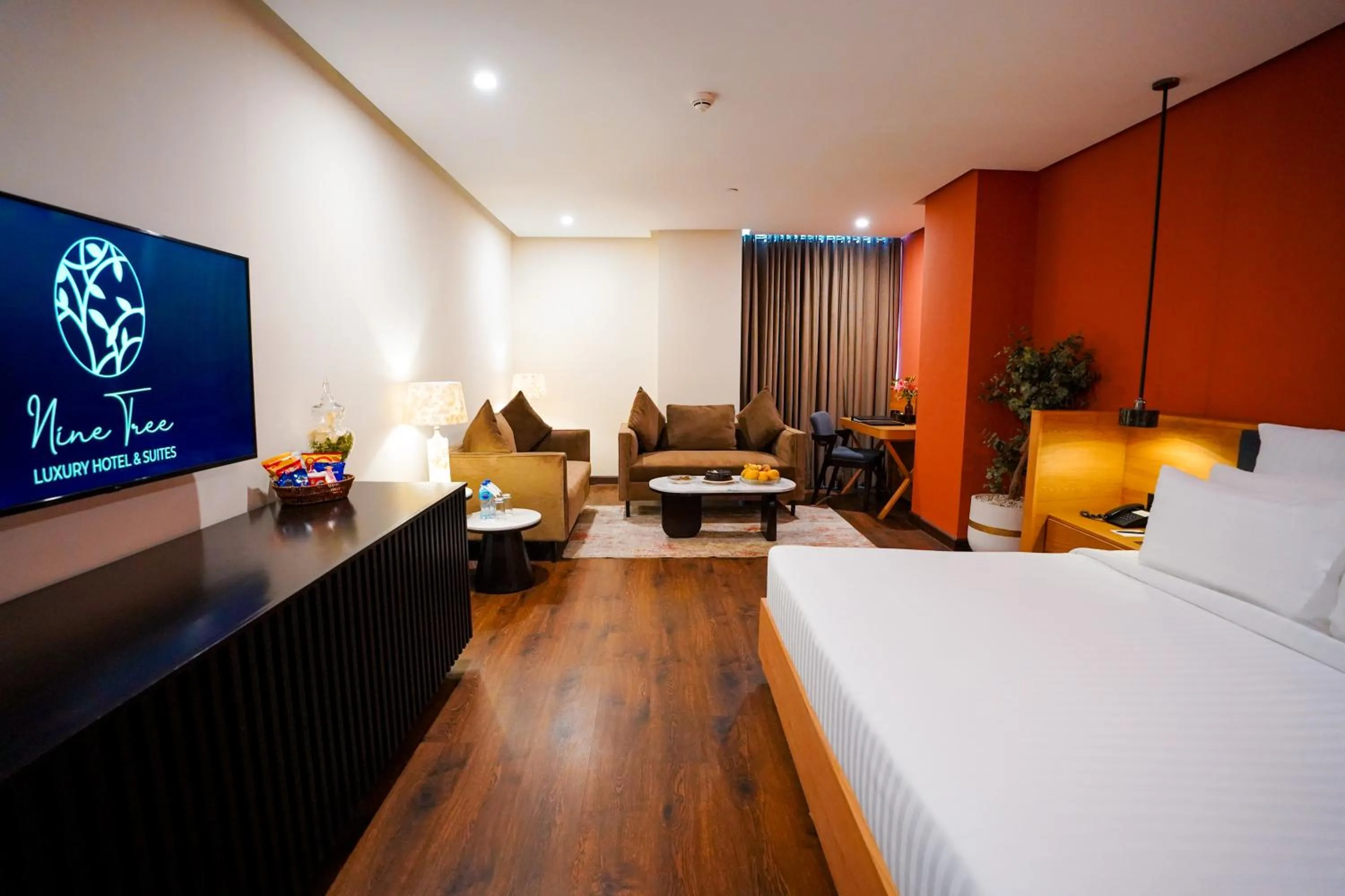 Photo of the whole room, Bed in Nine Tree Luxury Hotel & Suites Lahore