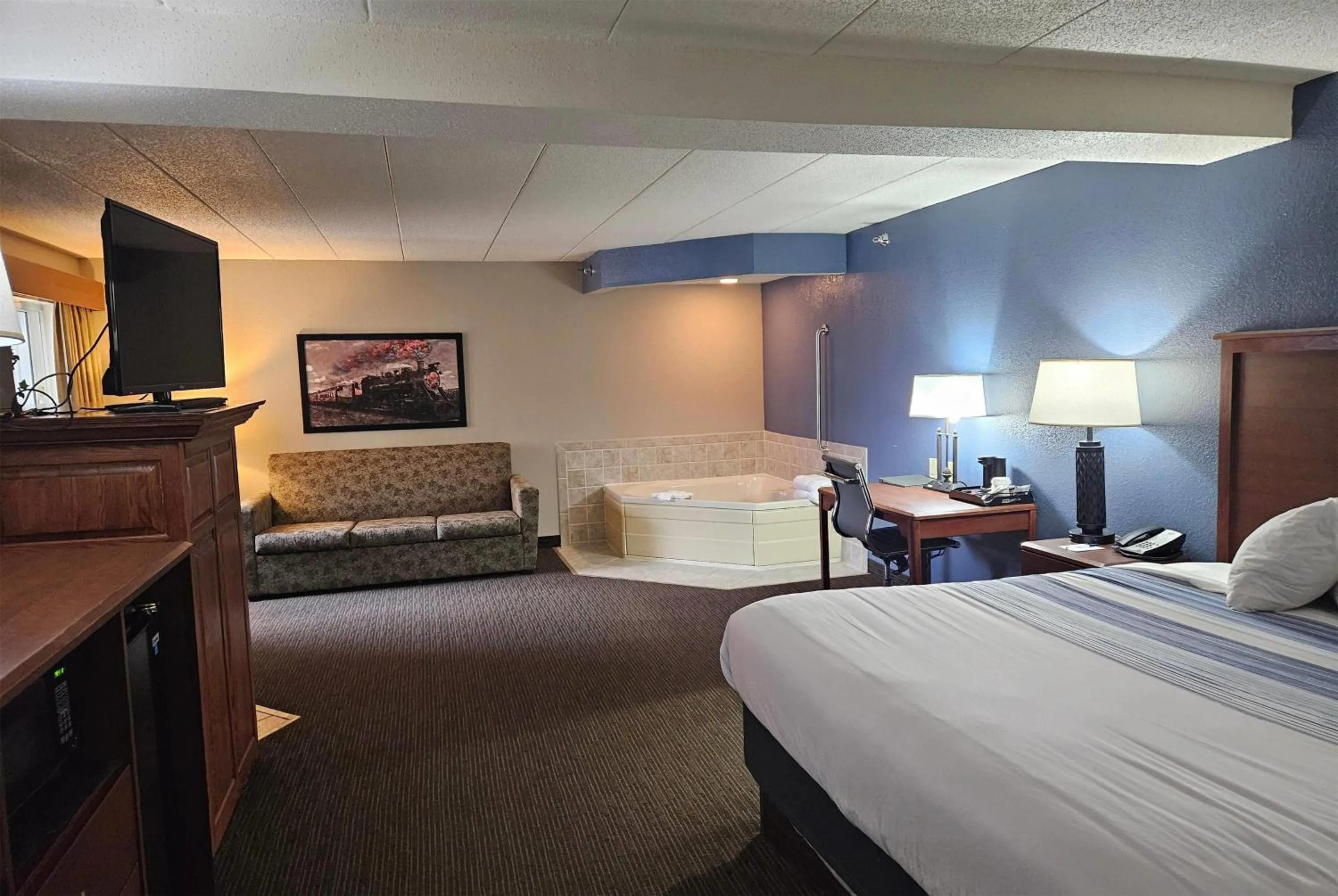 Photo of the whole room, Bed in AmericInn by Wyndham Marshall