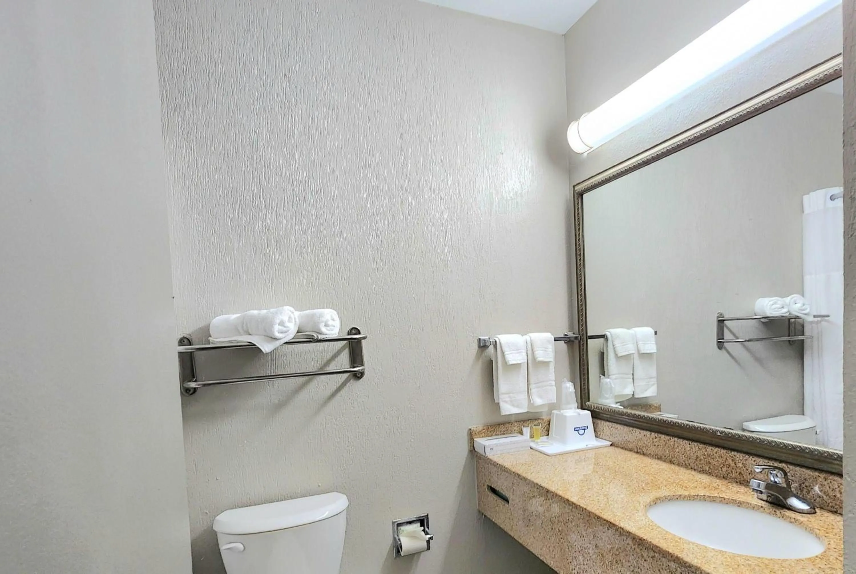 Bathroom in Days Inn by Wyndham Denham Springs-Baton Rouge East