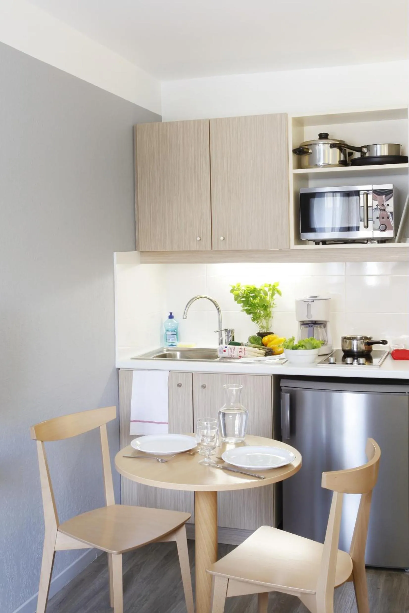 Kitchen or kitchenette in Aparthotel Adagio Access Marseille Prado Périer