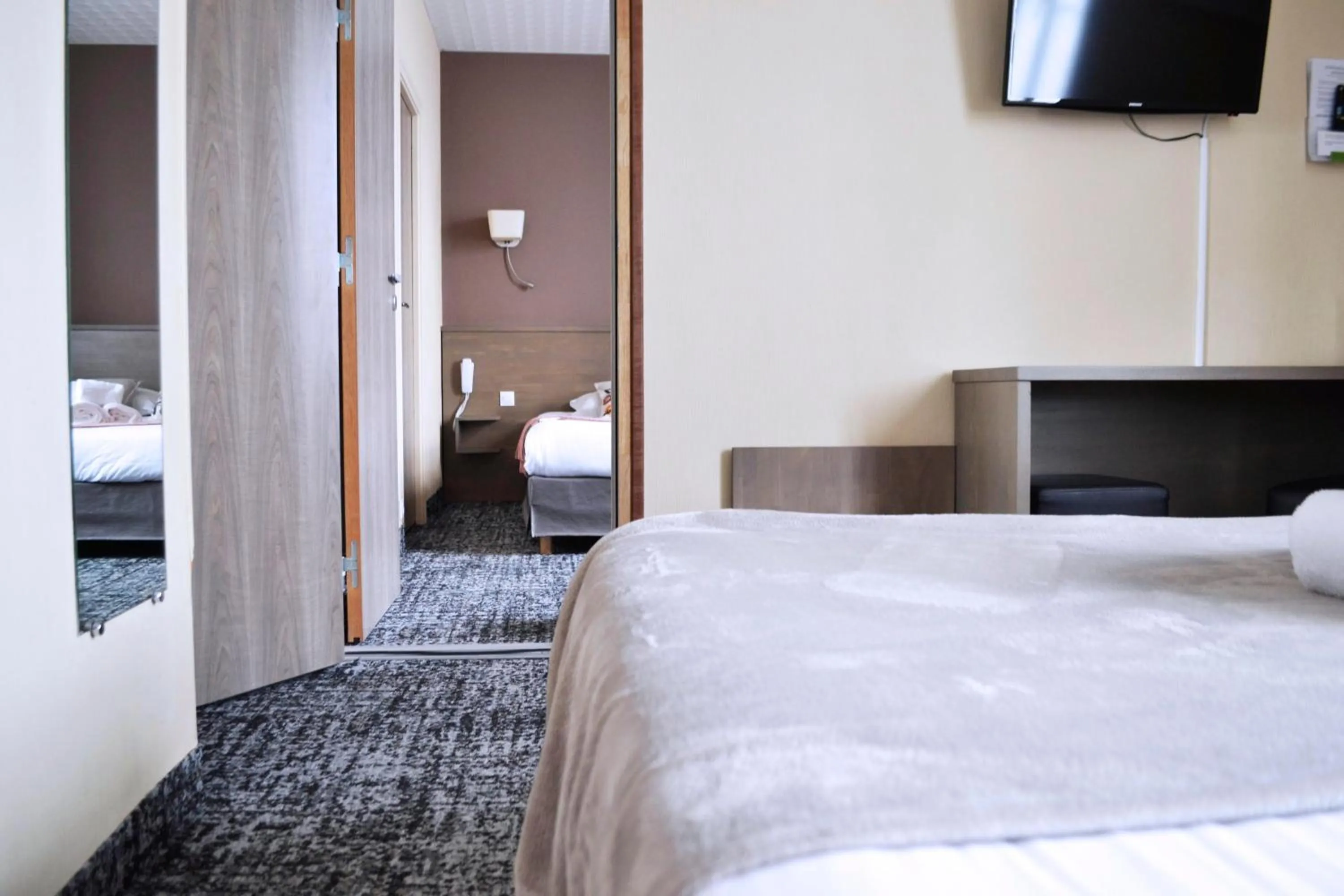 Bed in Brit Hotel Le Surcouf