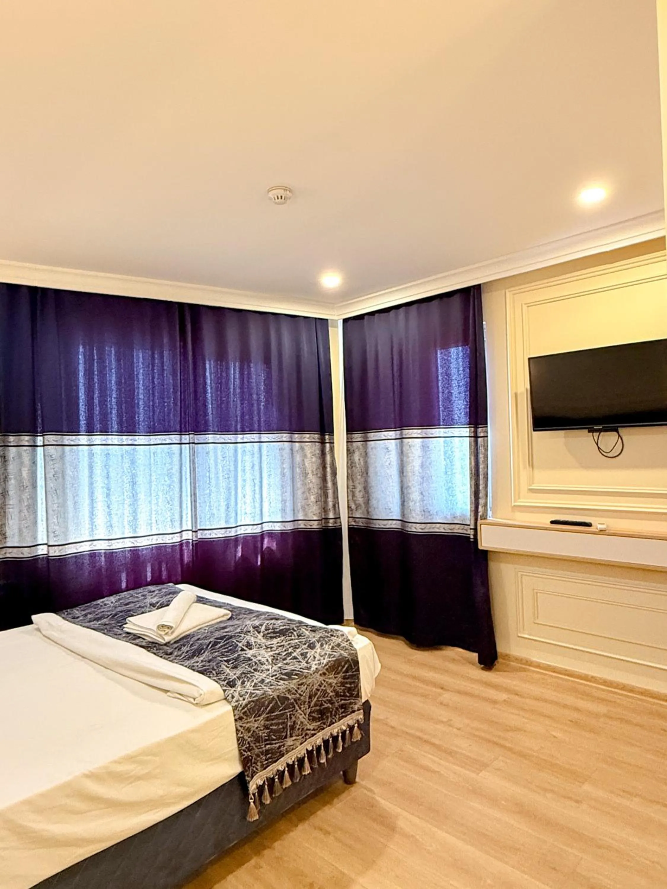 Bed in The Reina Hotel