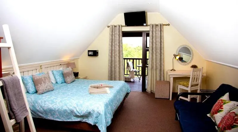 Bed in WarmKaros Bed & Breakfast